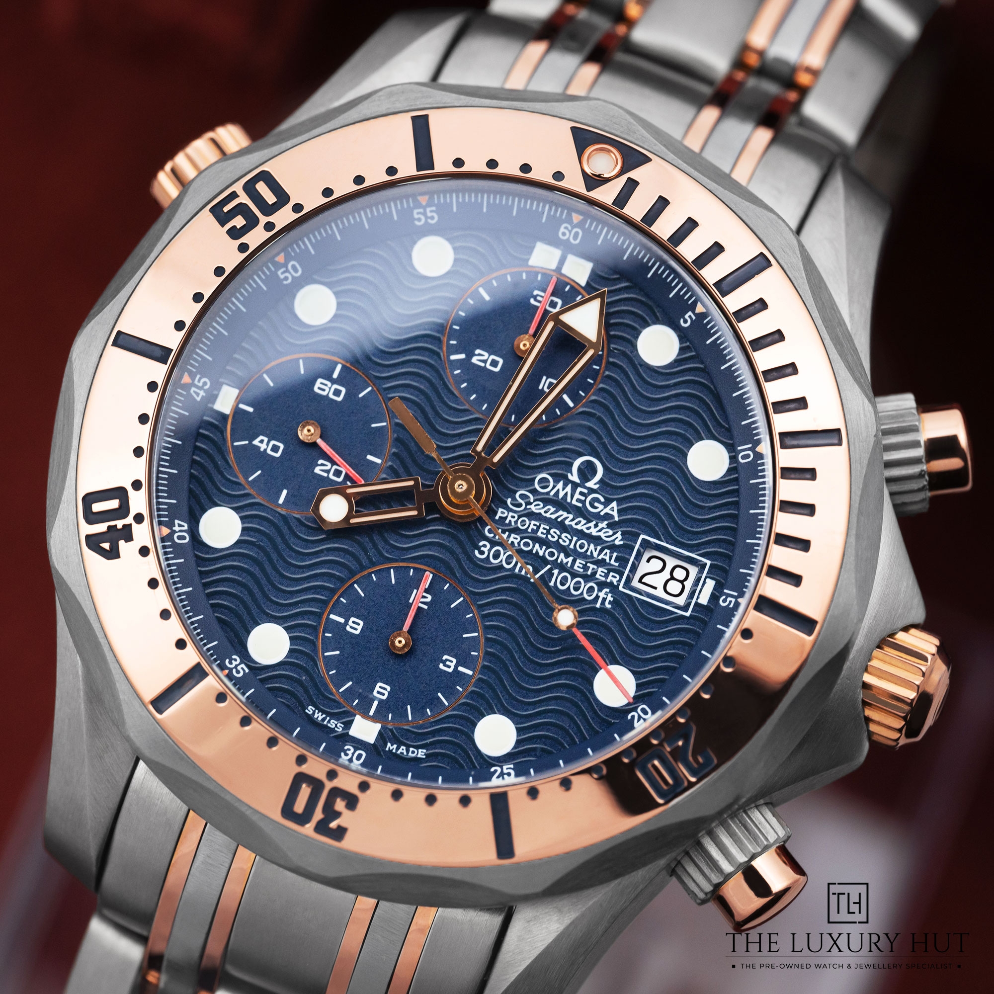 2025/05/Omega_Seamaster_300m_Titanium_Rose_Gold_Blue_LB539e.jpg