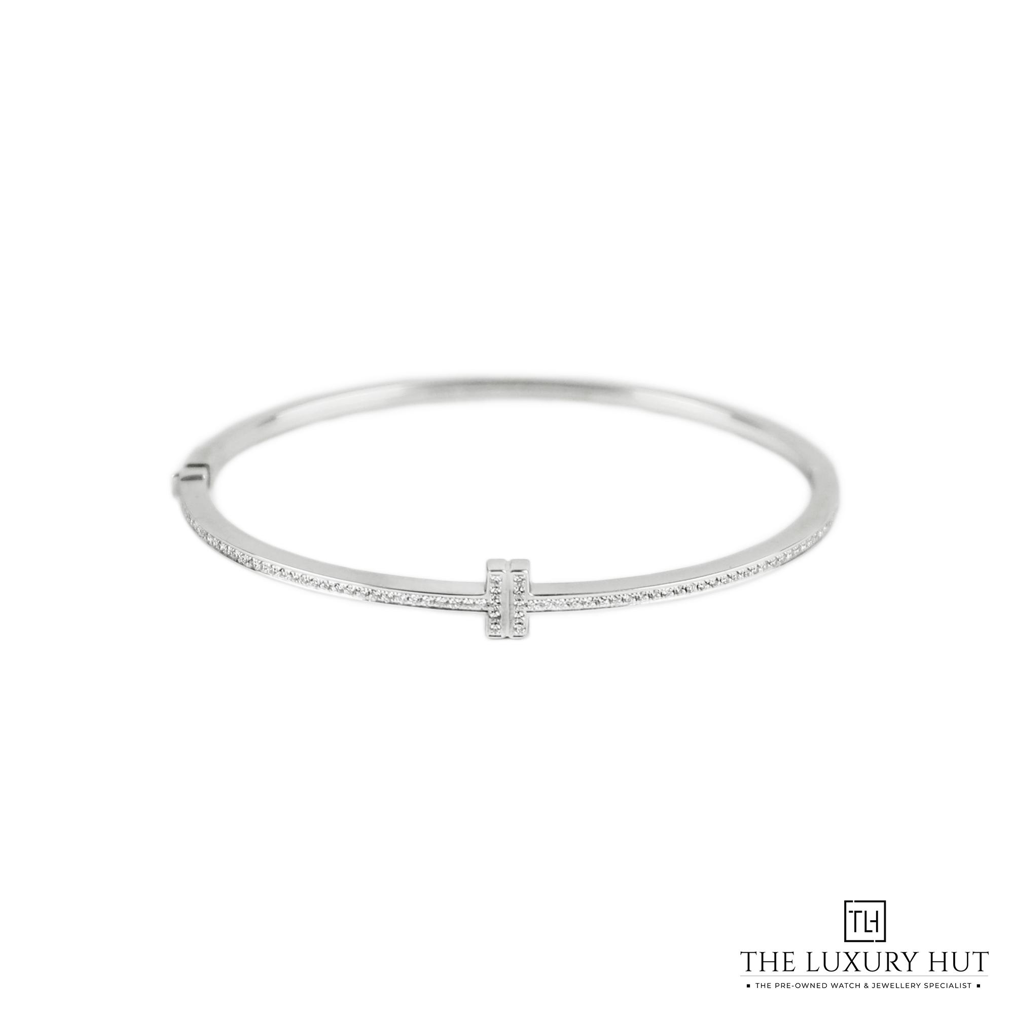 2024/08/Tiffany_T-Diamond_Hinged_White_Bangle_51033-a.jpg