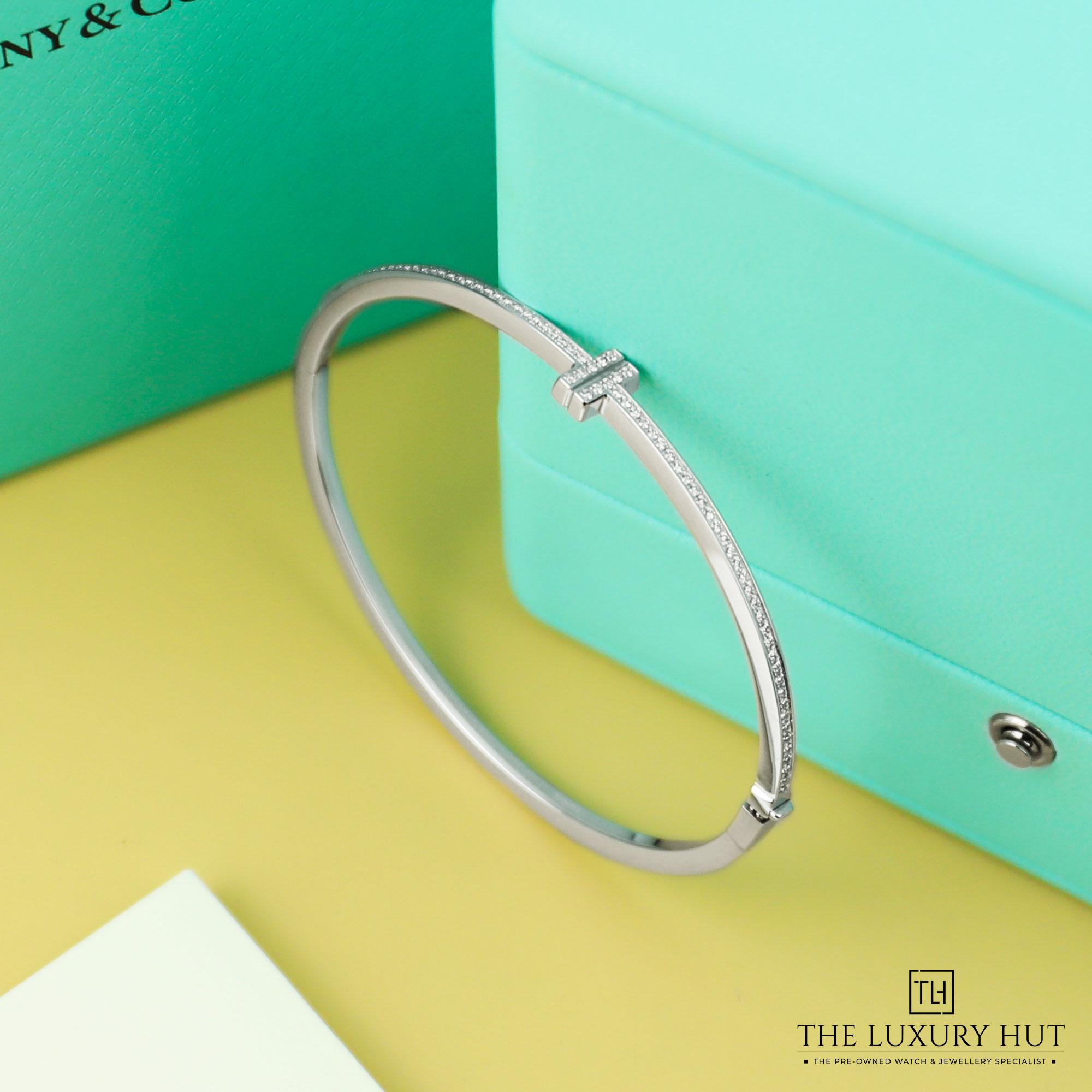 2024/08/Tiffany_T-Diamond_Hinged_White_Bangle_51033-c.jpg