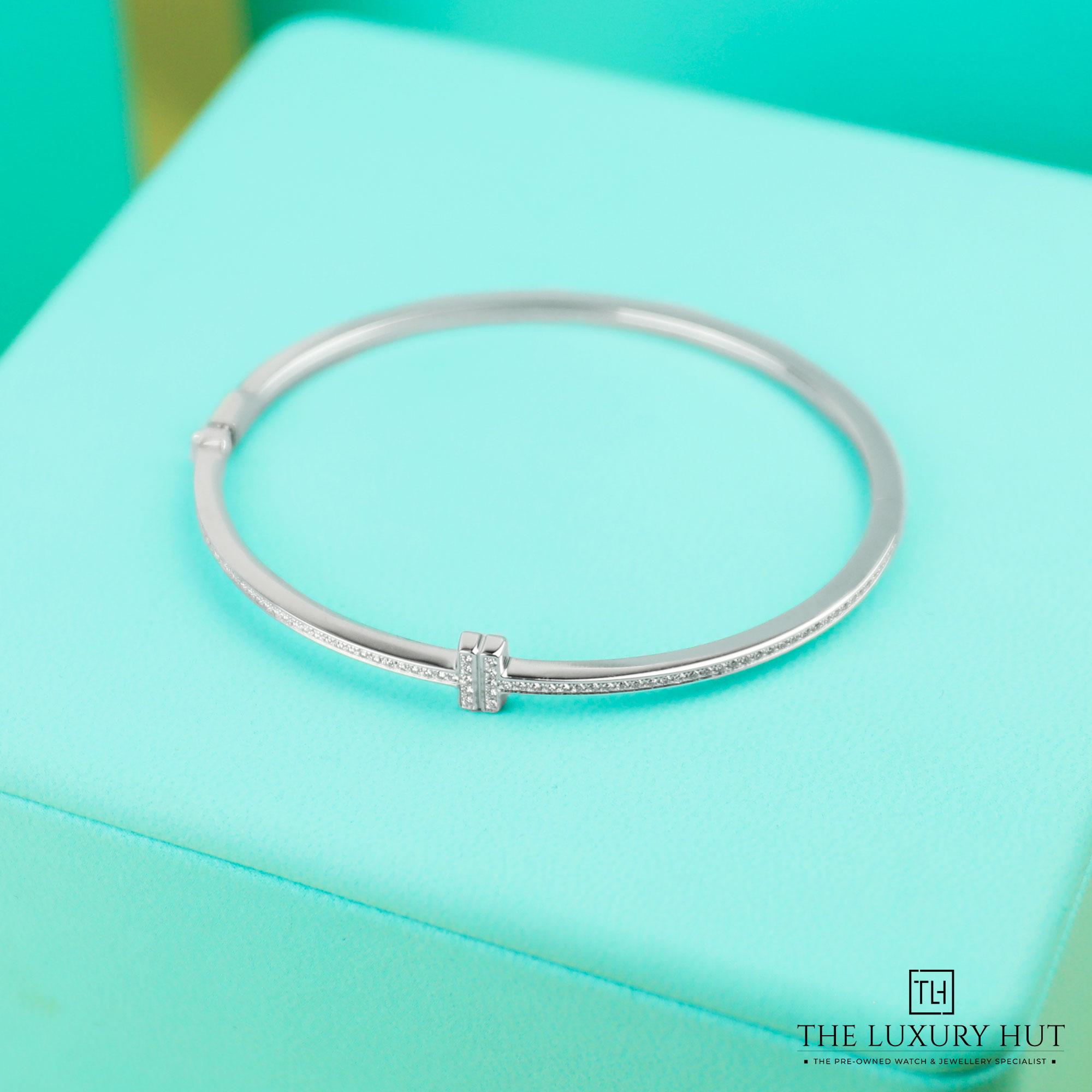 2024/08/Tiffany_T-Diamond_Hinged_White_Bangle_51033-d.jpg