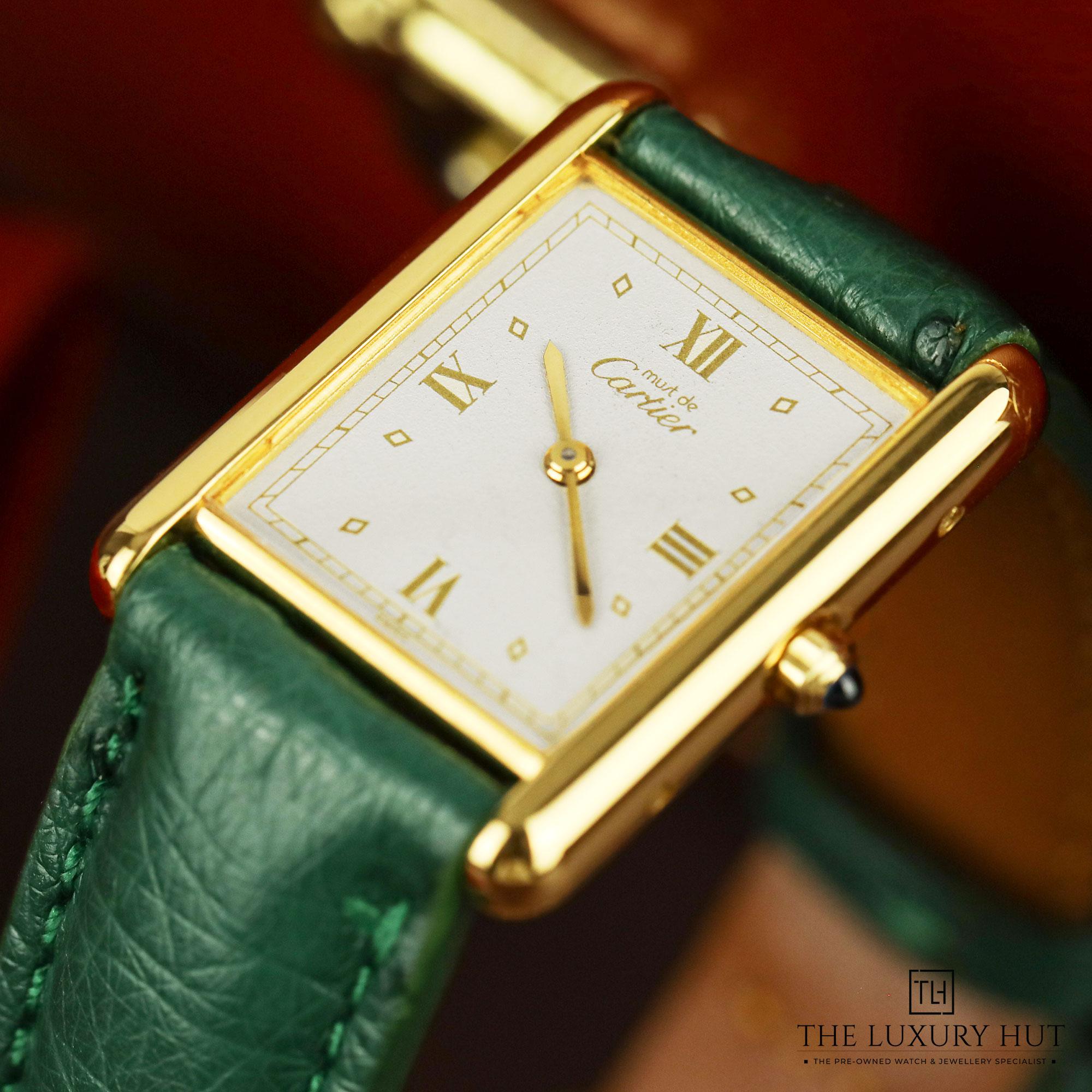 2024/09/Cartier_Tank-_Vermeil_Silver_Roman_Dial_50607-h.jpg