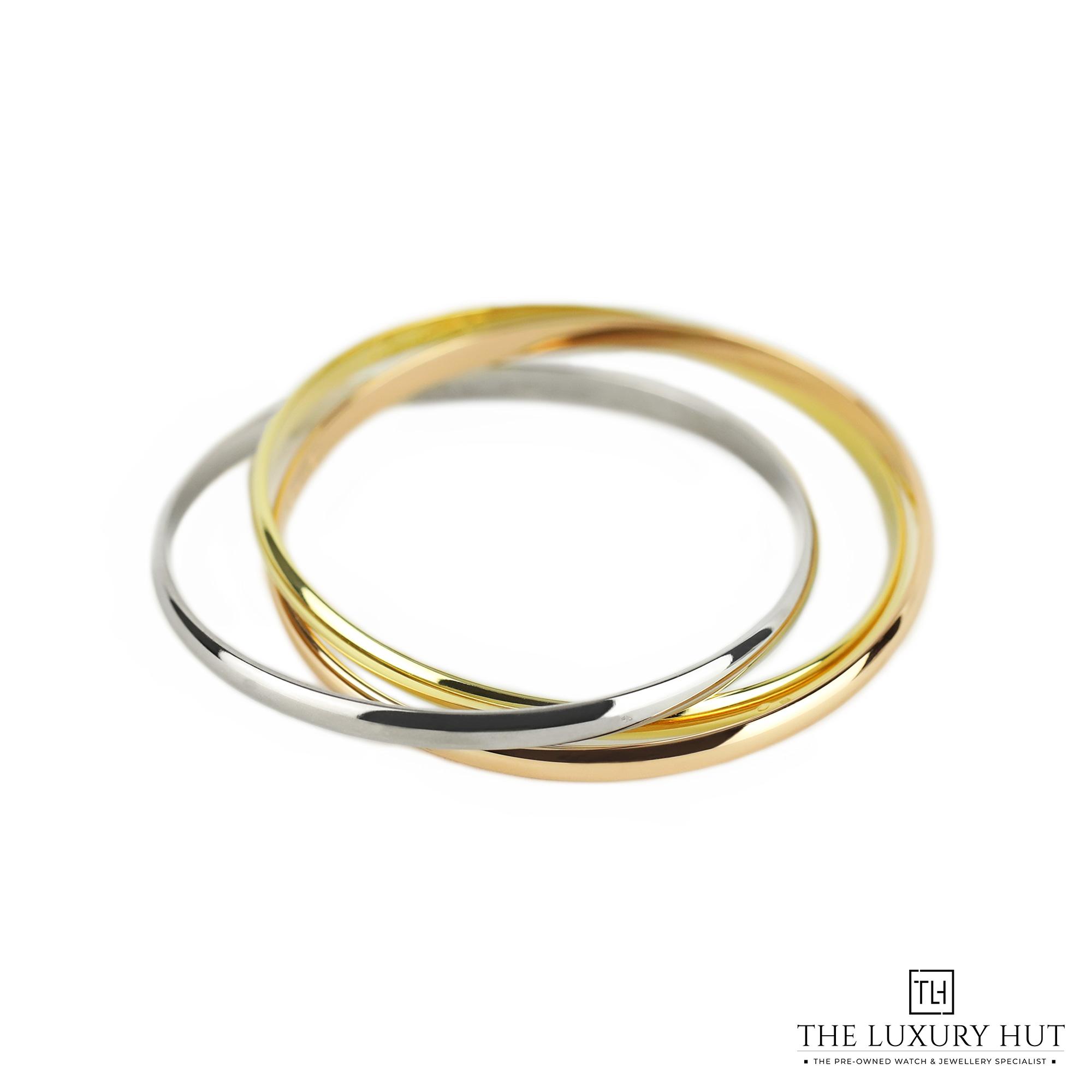 2024/09/Cartier_Tri-Colour_Gold_Trinity_Bracelet_51111-a.jpg