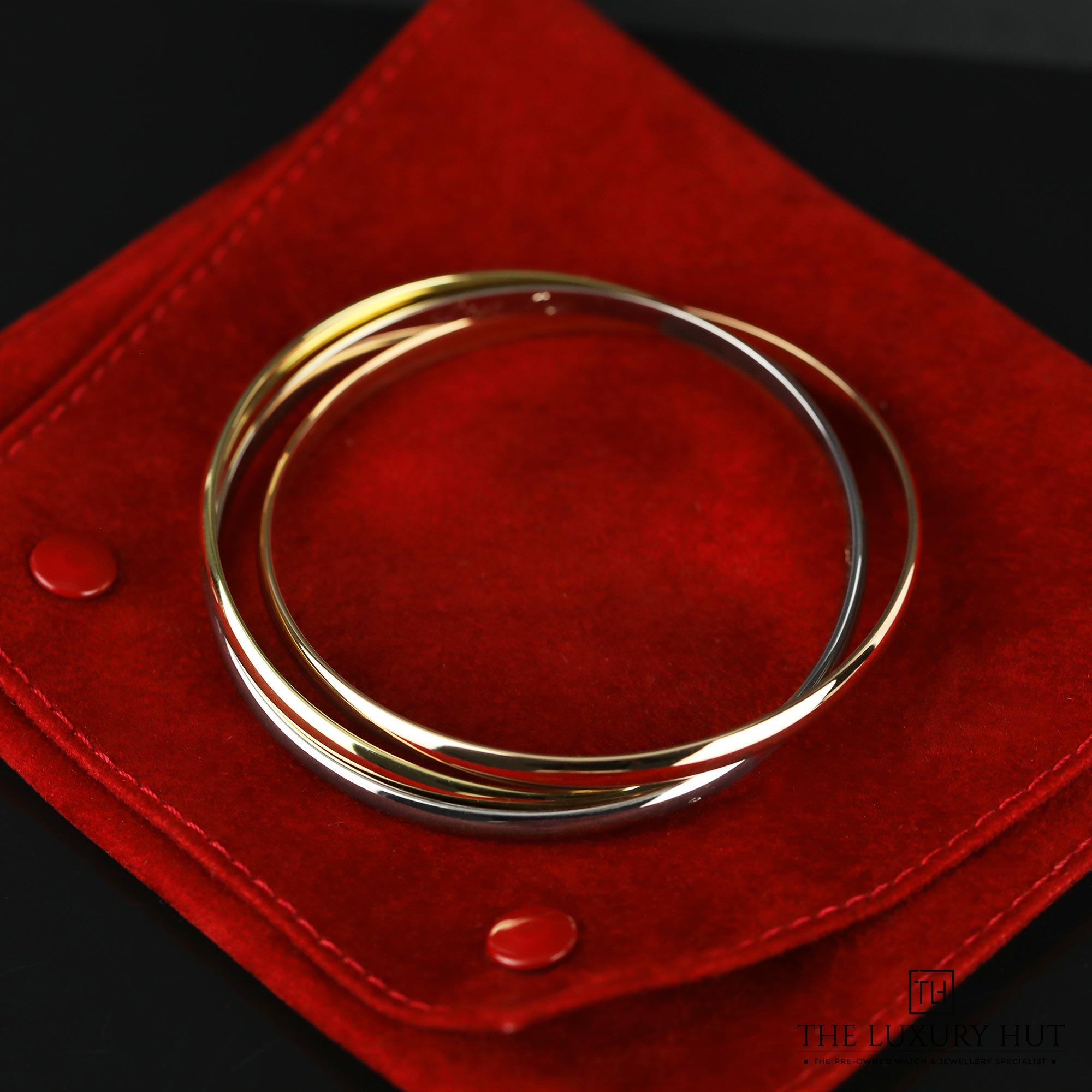 2024/09/Cartier_Tri-Colour_Gold_Trinity_Bracelet_51111-c.jpg