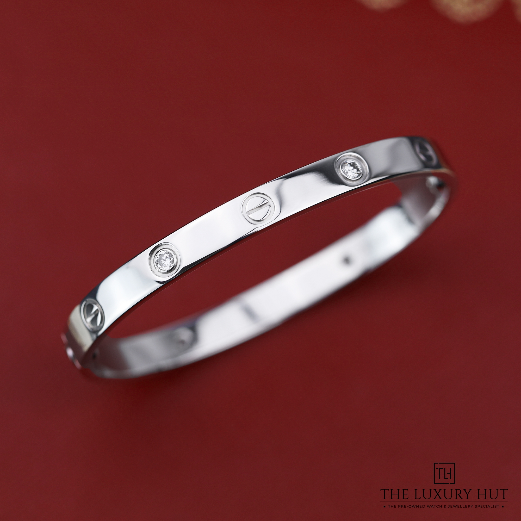 2024/11/Cartier_White_Gold_4-Diamonds_Love_Bangle_51327-c.jpg