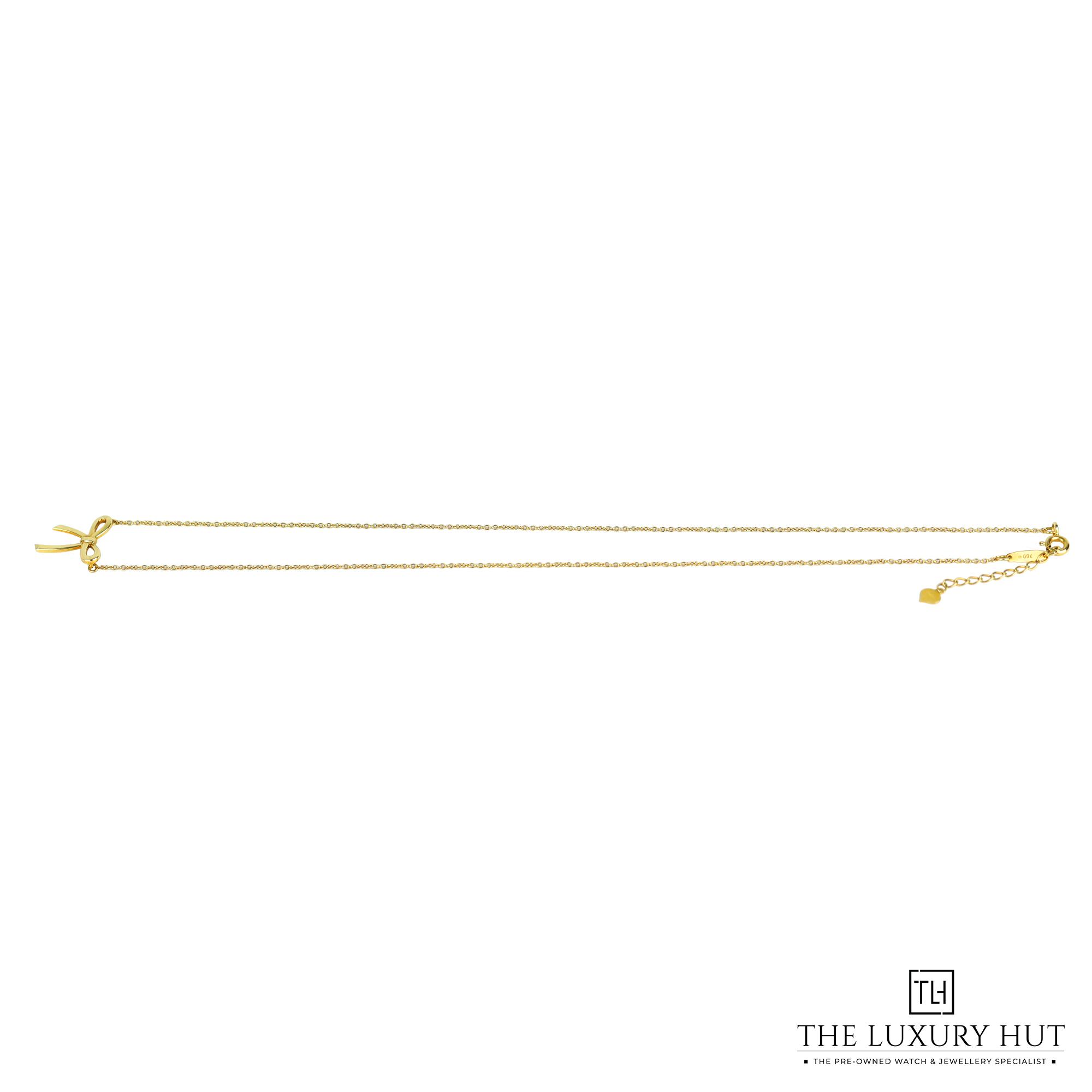 2024/11/Tiffany_Yellow_Gold_Ribbon_Pendant_LB398-b.jpg
