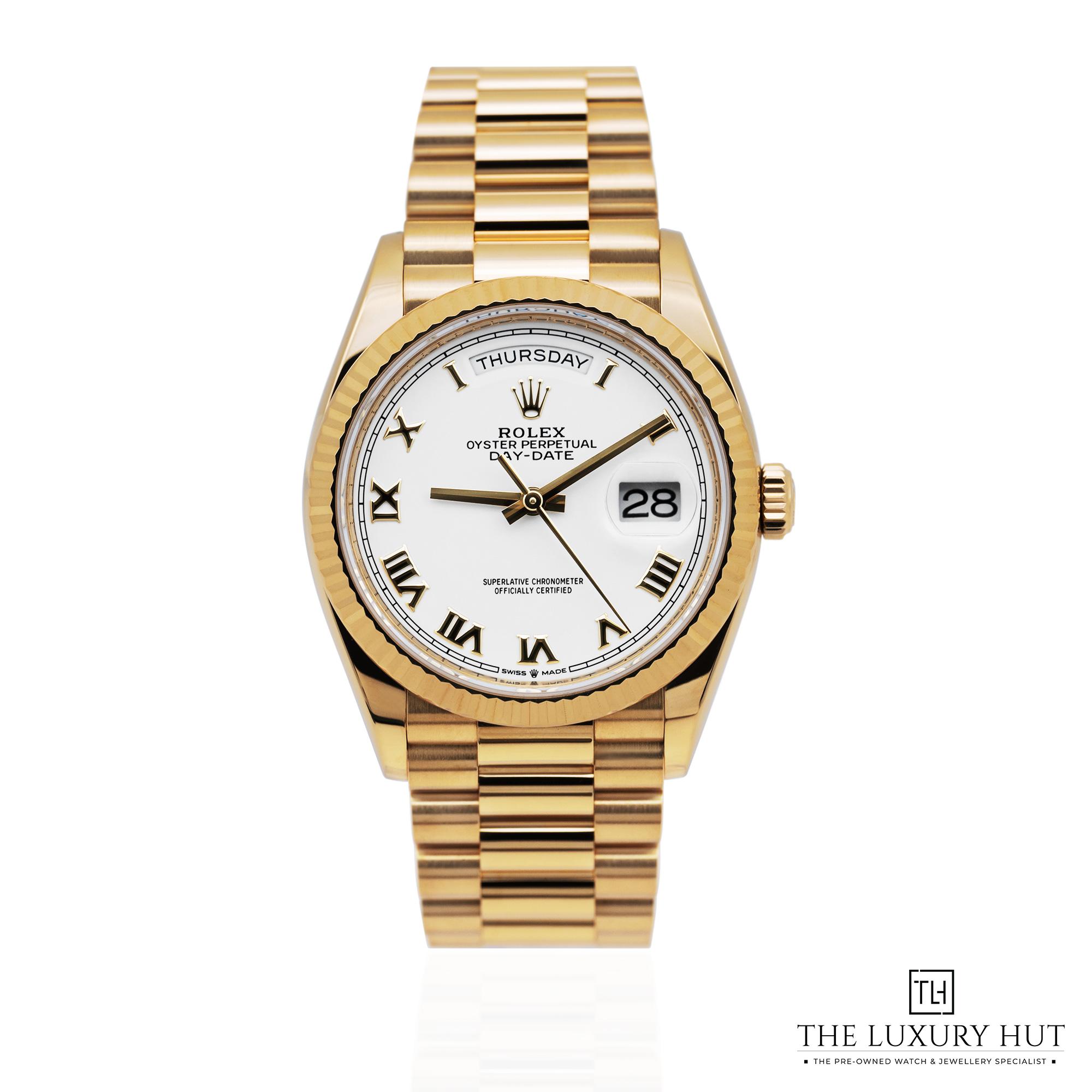 2025/08/Rolex_Day-Date_36_Gold_White_Roman_Dial_52097-a.jpg