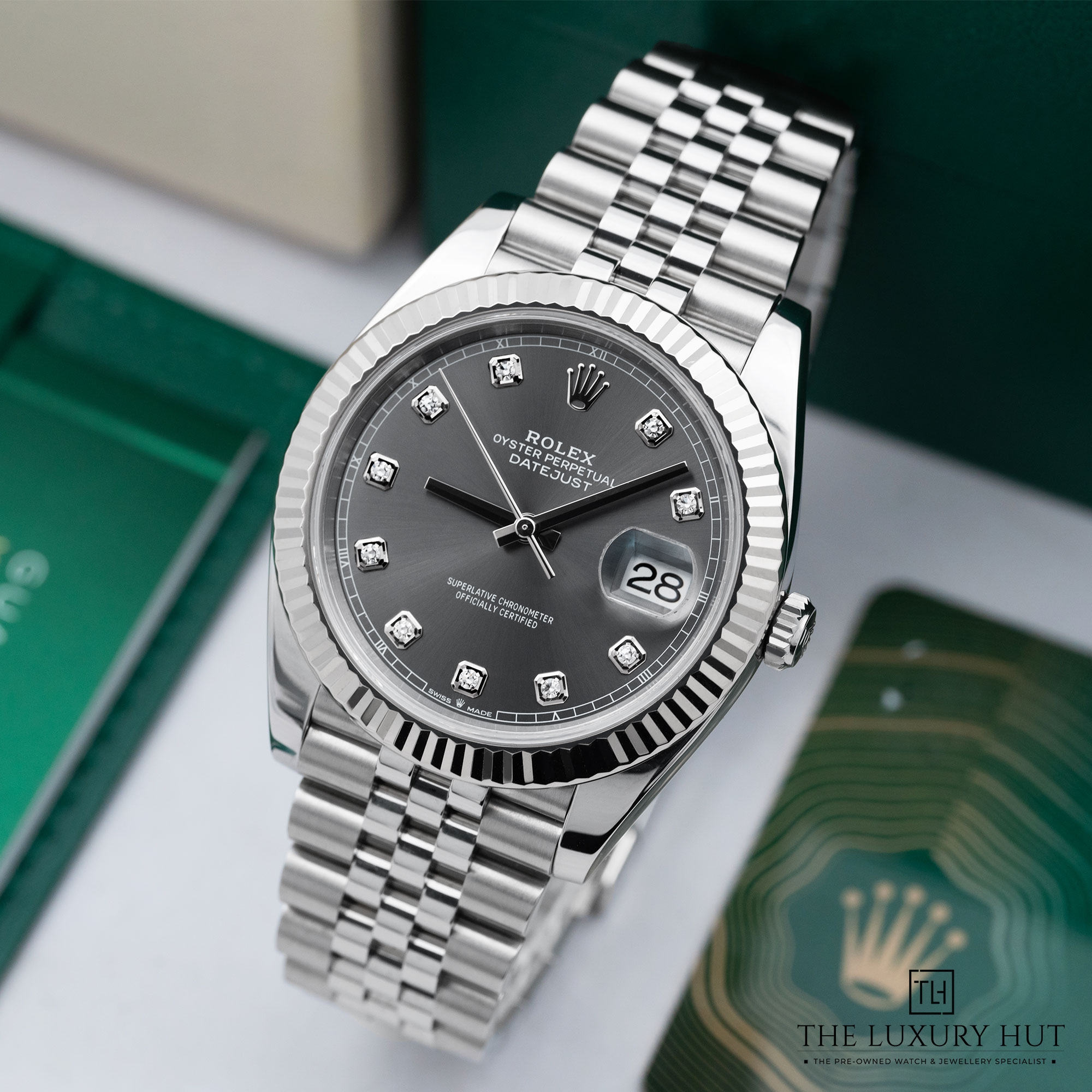 2025/10/20ef63e5-dccd-4213-8f0d-c32db9a54431Rolex_Datejust_41mm_Rhodium_Diamond_Dial_52275-b.jpg