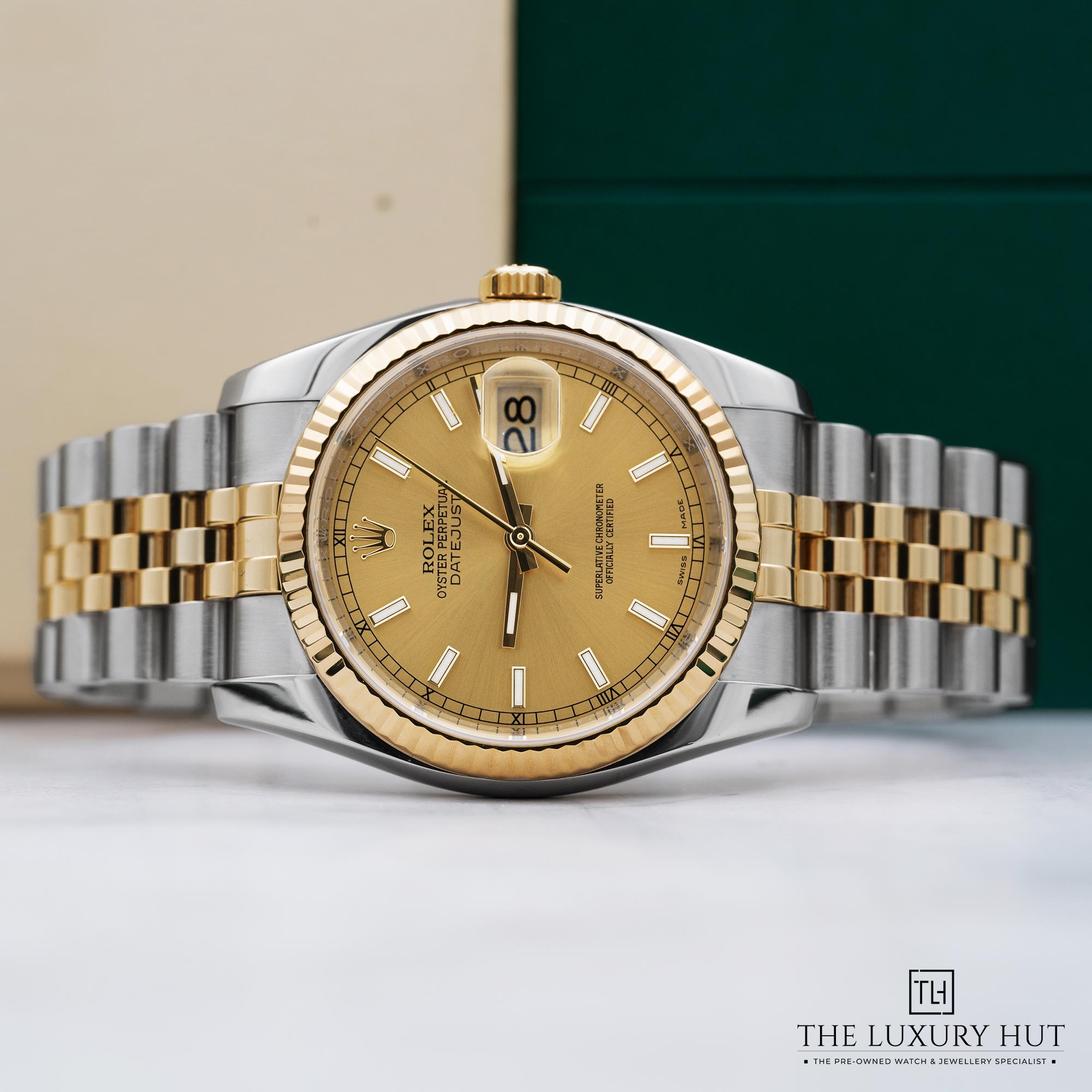 2025/10/53a14c15-6eac-48d1-aded-d7d3d4381f51Rolex-datejust-36-bi-metal-champagne-baton-dial-52246-b.jpg