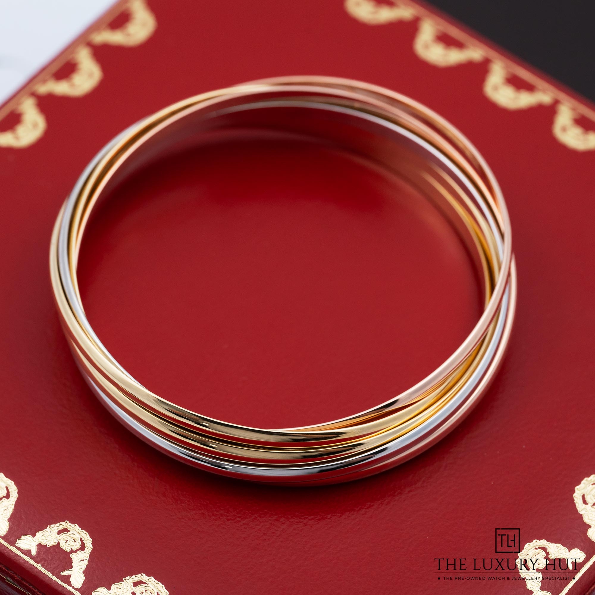 2025/10/9f134fb6-38b6-459d-97e5-1b094438da0aCartier_Trinity_Bangle_18ct_Gold_7_Interlocking_Bands_52304-c.jpg