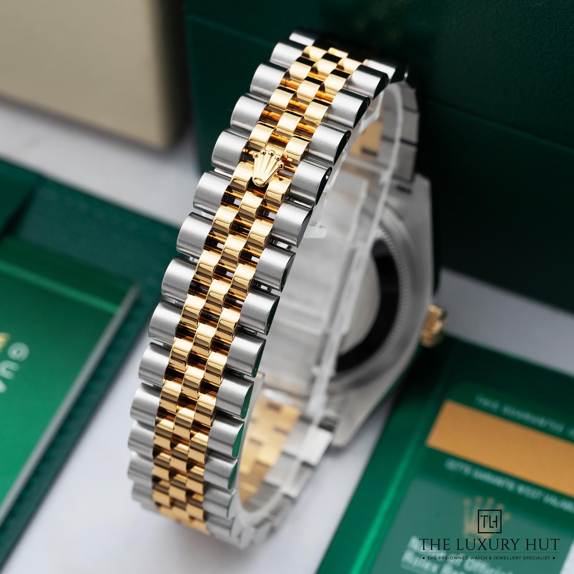 2025/10/db2736d0-0091-4b4d-a13e-7c843688aef2Rolex-datejust-36-bi-metal-champagne-baton-dial-52246-d.jpg