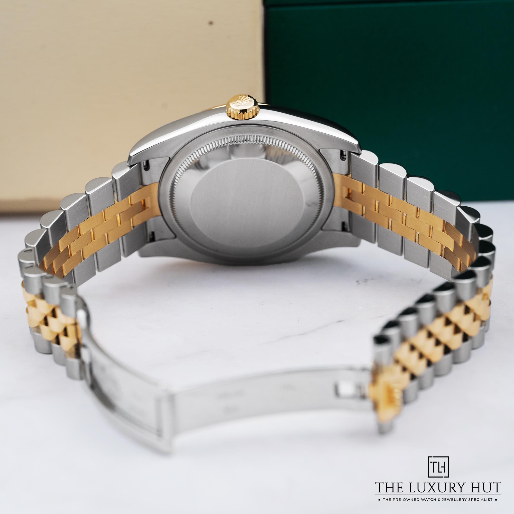 2025/10/fd673f51-f5f8-4510-b206-b81967d63bedRolex-datejust-36-bi-metal-champagne-baton-dial-52246-c.jpg