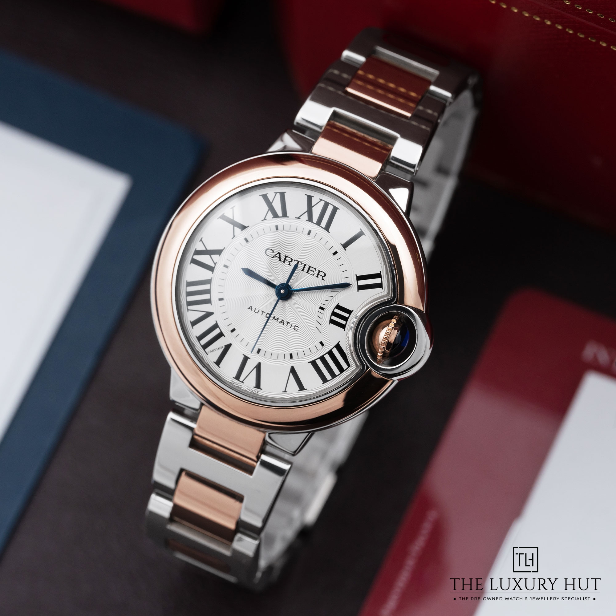 2025/11/ad65ad61-5321-422e-9655-b0cc64416a10Cartier_Ballon_Bleu_Steel_Gold_33mm_Silver_Roman_Update_LB734-b1.jpg