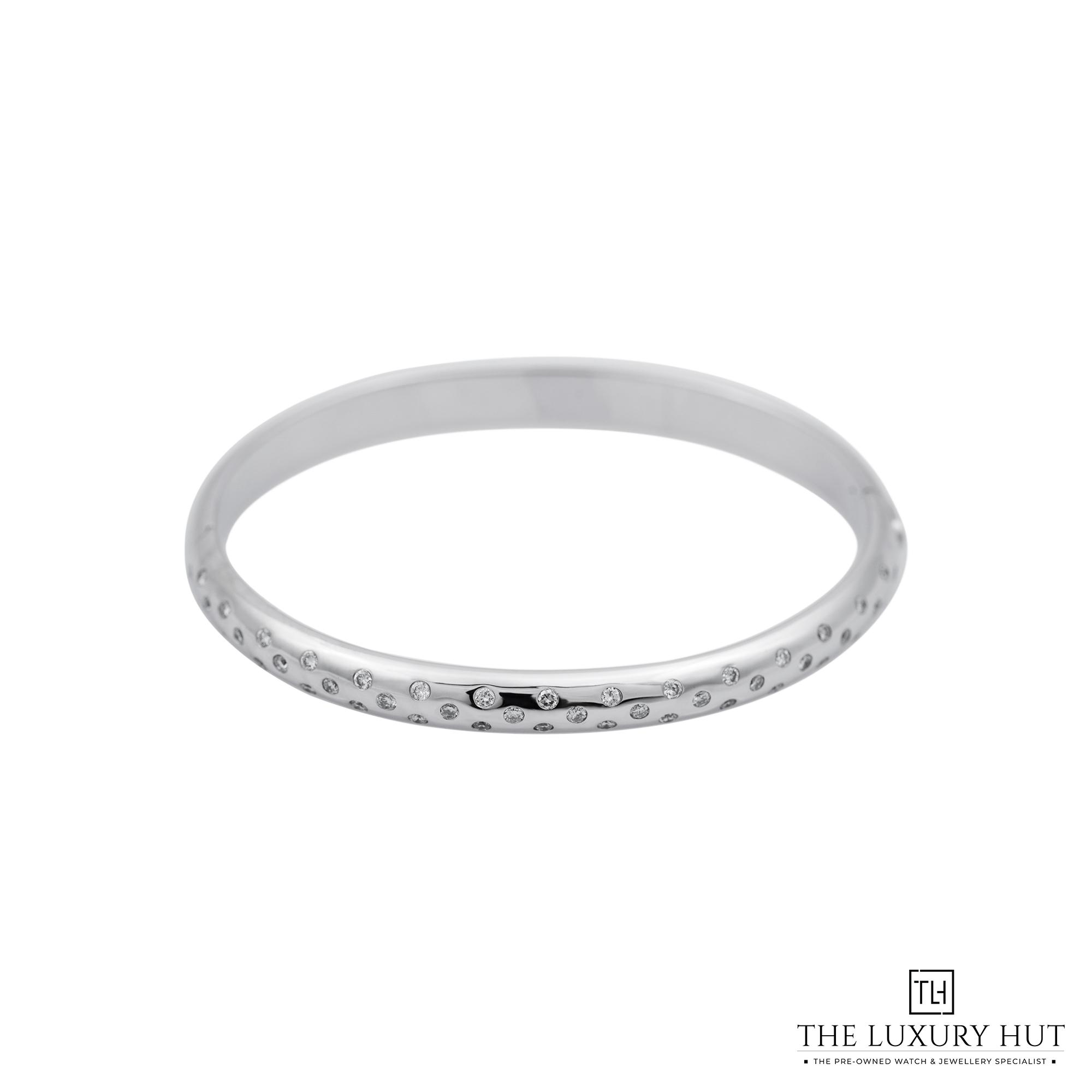 2025/11/fa44927a-f1e9-42d1-89d4-f8506d84719118ct_White_Gold_1.20ct_Diamond_Bangle_52391-a.jpg