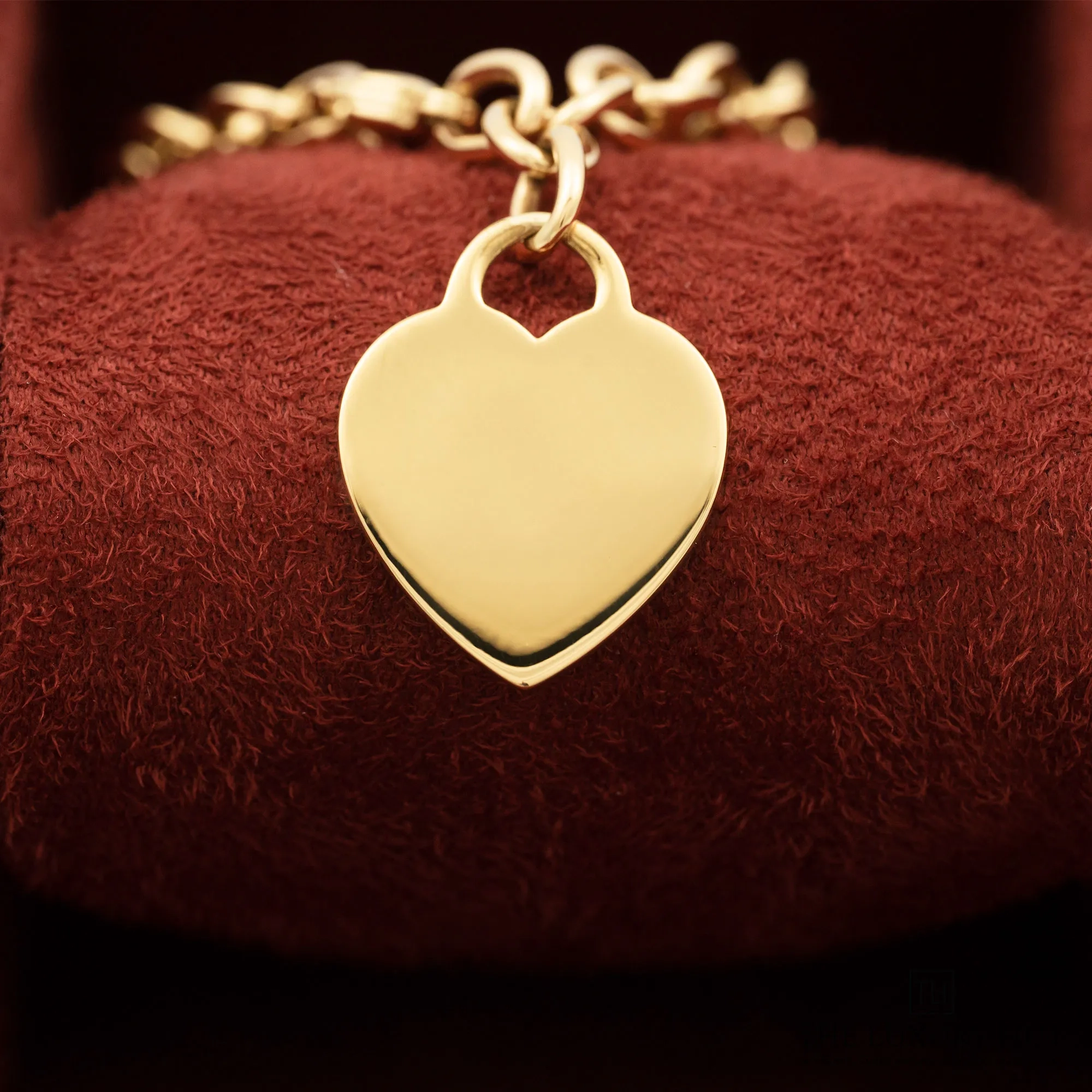 2025/12/13591df0-0d41-45e6-9160-4a53b08a30c0Tiffany_Yellow_Gold_Heart_Tag_Charm_Bracelet_LB773-c.jpg.webp
