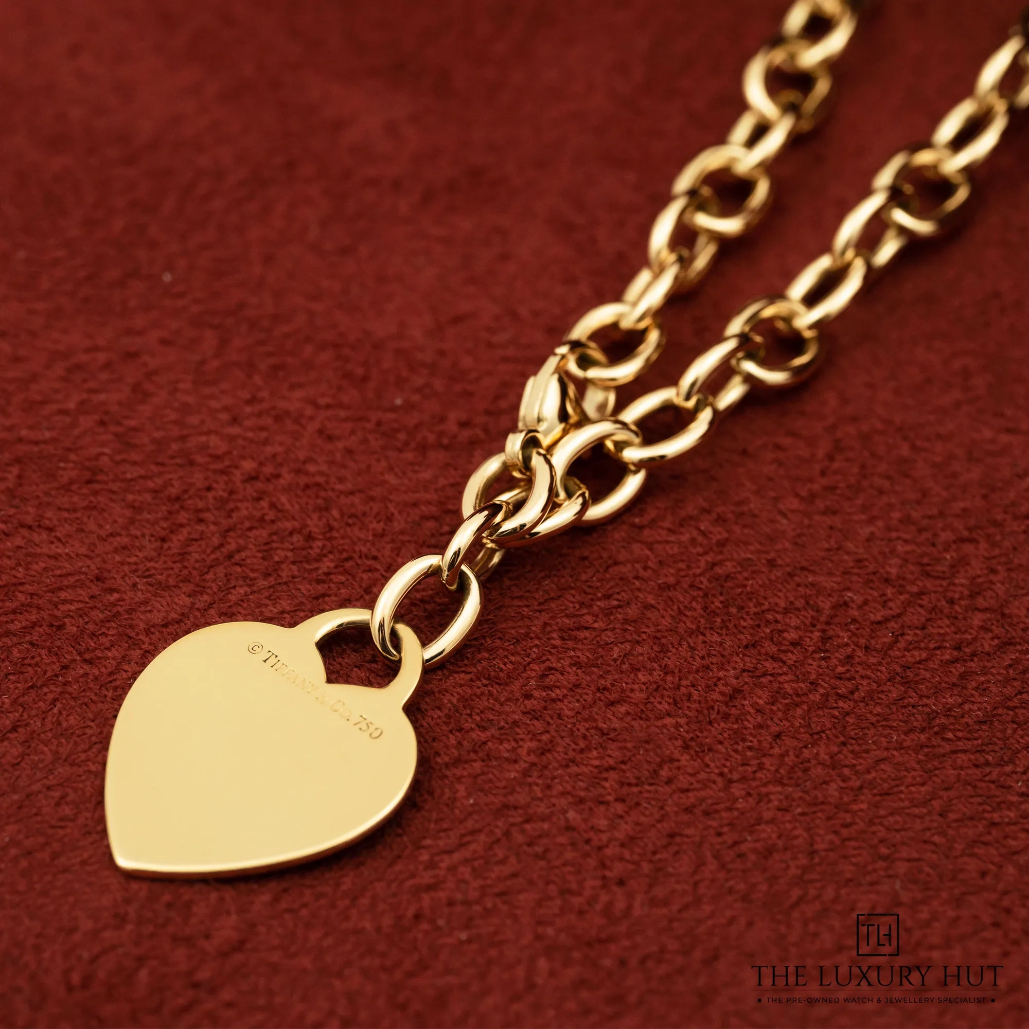 2025/12/1cc8e37b-5741-4461-b733-9904e47d9befTiffany_Yellow_Gold_Heart_Tag_Charm_Bracelet_LB773-b.jpg.webp