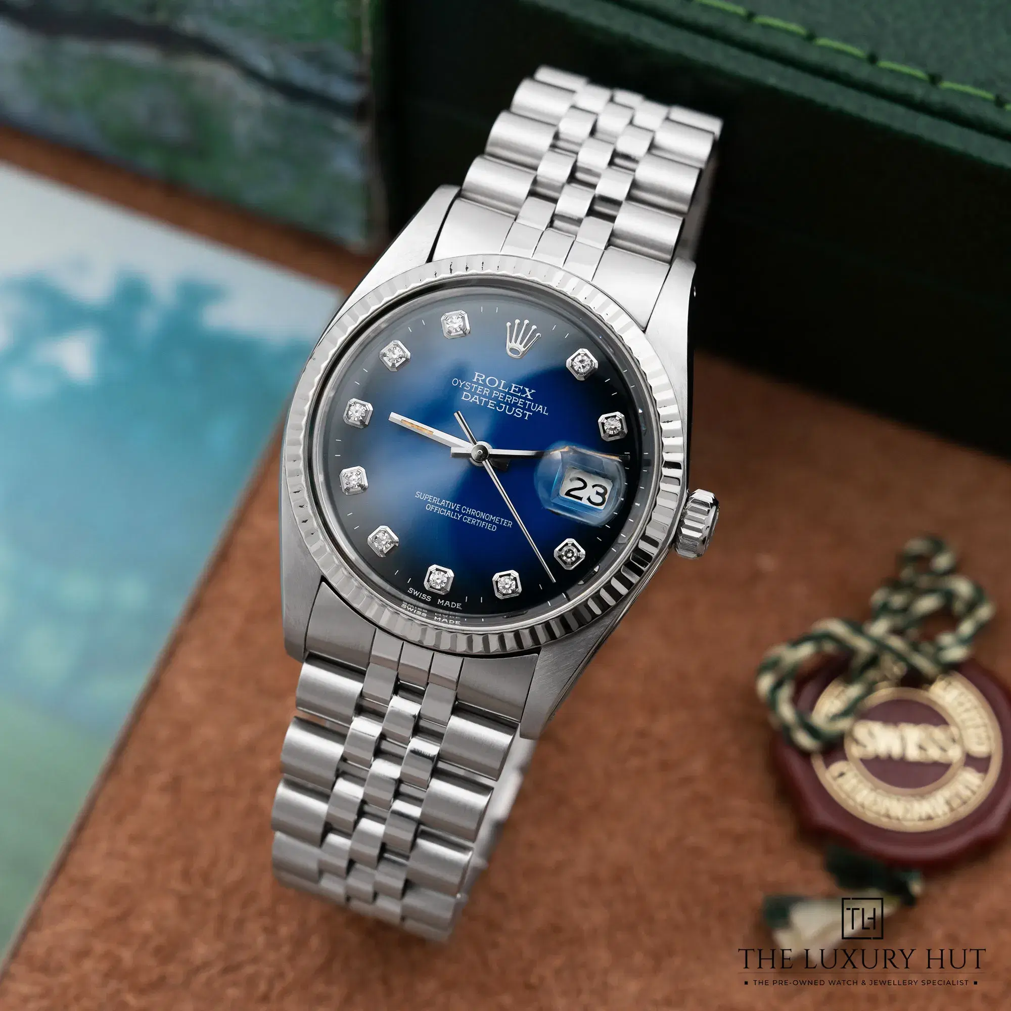 2025/12/2921e9fe-96d5-4926-8fd7-876dc1c8af4bRolex_Datejust_36_Custom_Blue_Vignette_Diamond_52487-b.jpg.webp