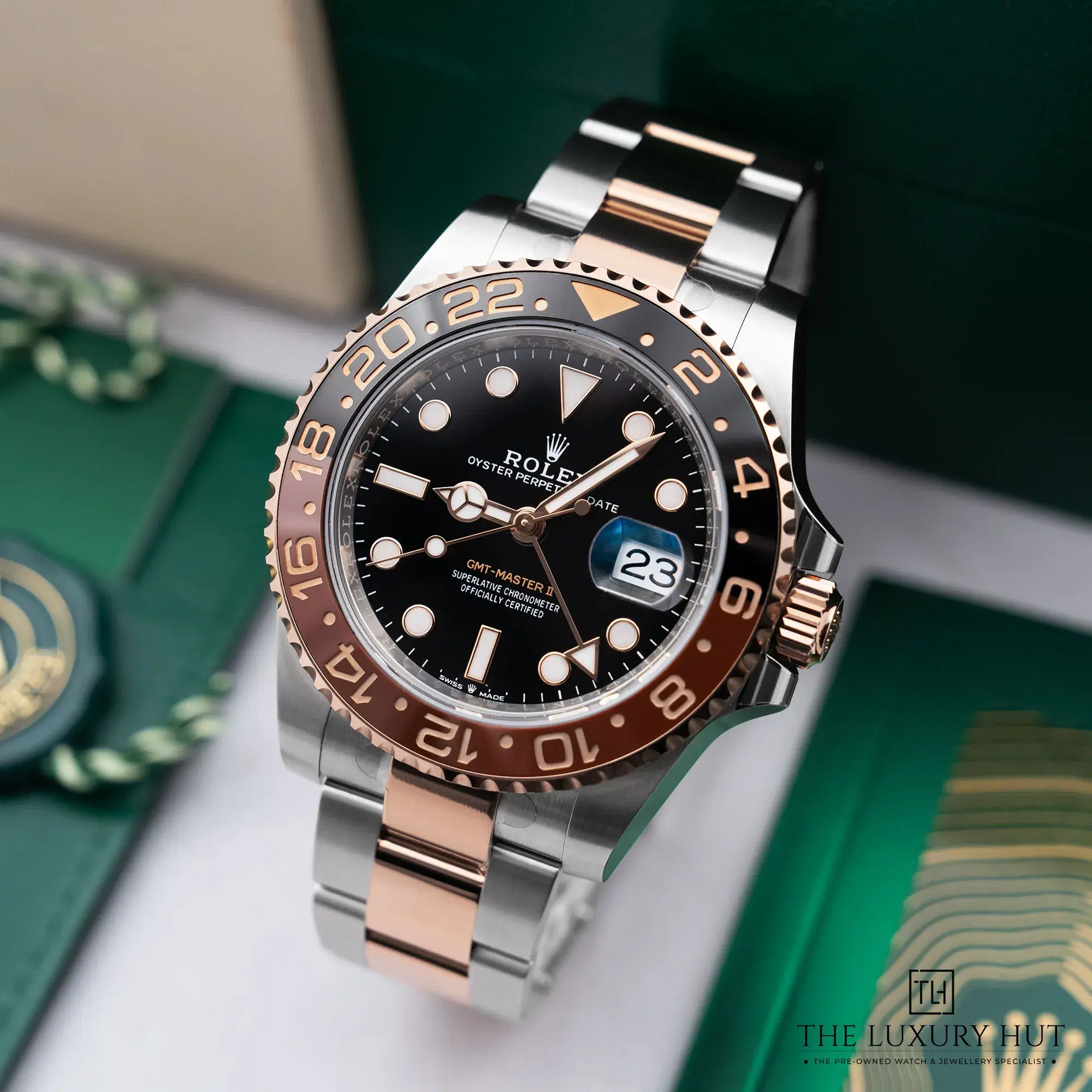2025/12/32fd5132-426a-46e2-8c06-a479cba8ee81Rolex_GMT-Master_II_Rootbeer_Steel_Gold_Black_52501-b.jpg.webp