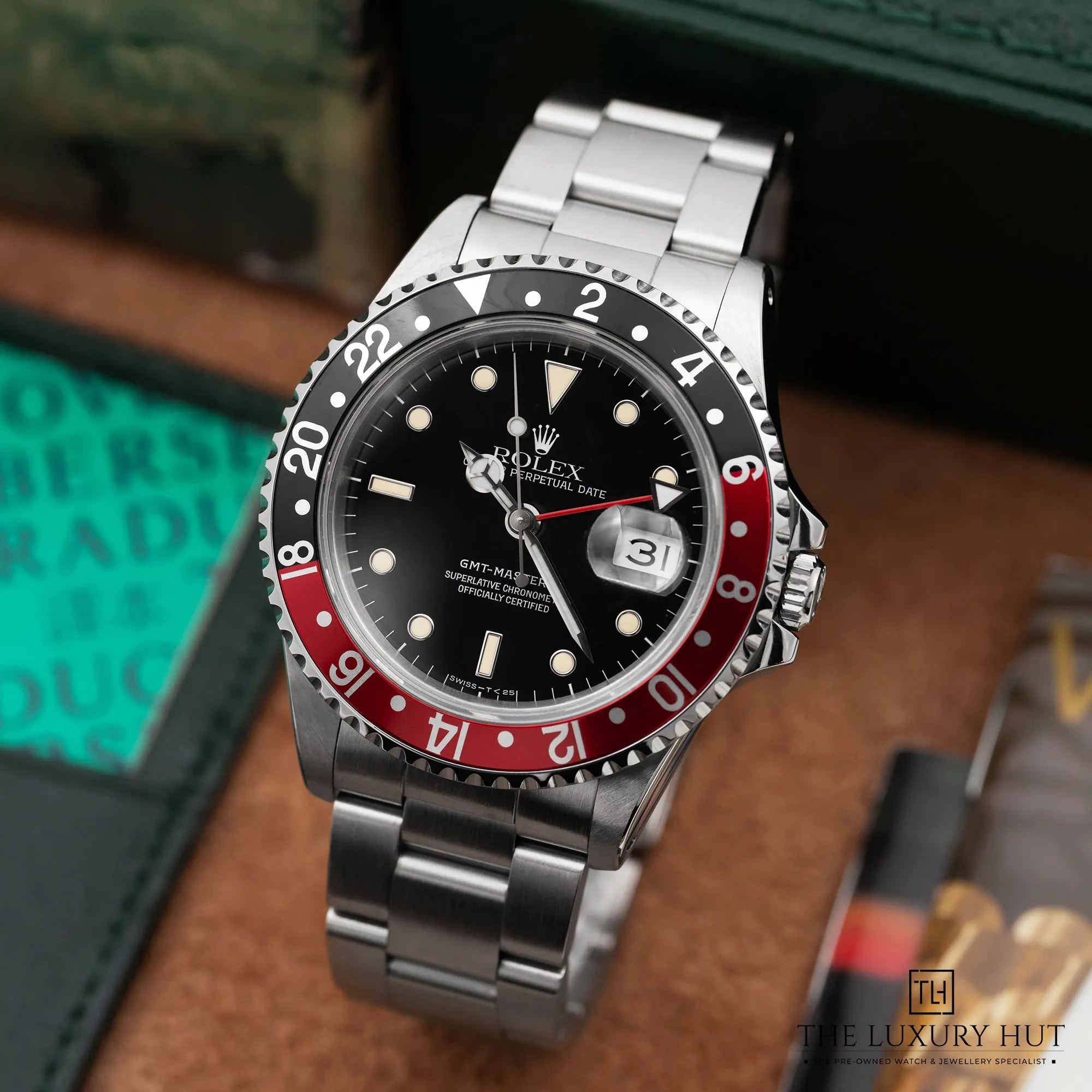 2025/12/6a2aaed5-f808-4f4c-a3b1-534fb72c1e51Rolex_GMT-Master_II_Coke_Steel_40mm_Black_52442-b.jpg.webp