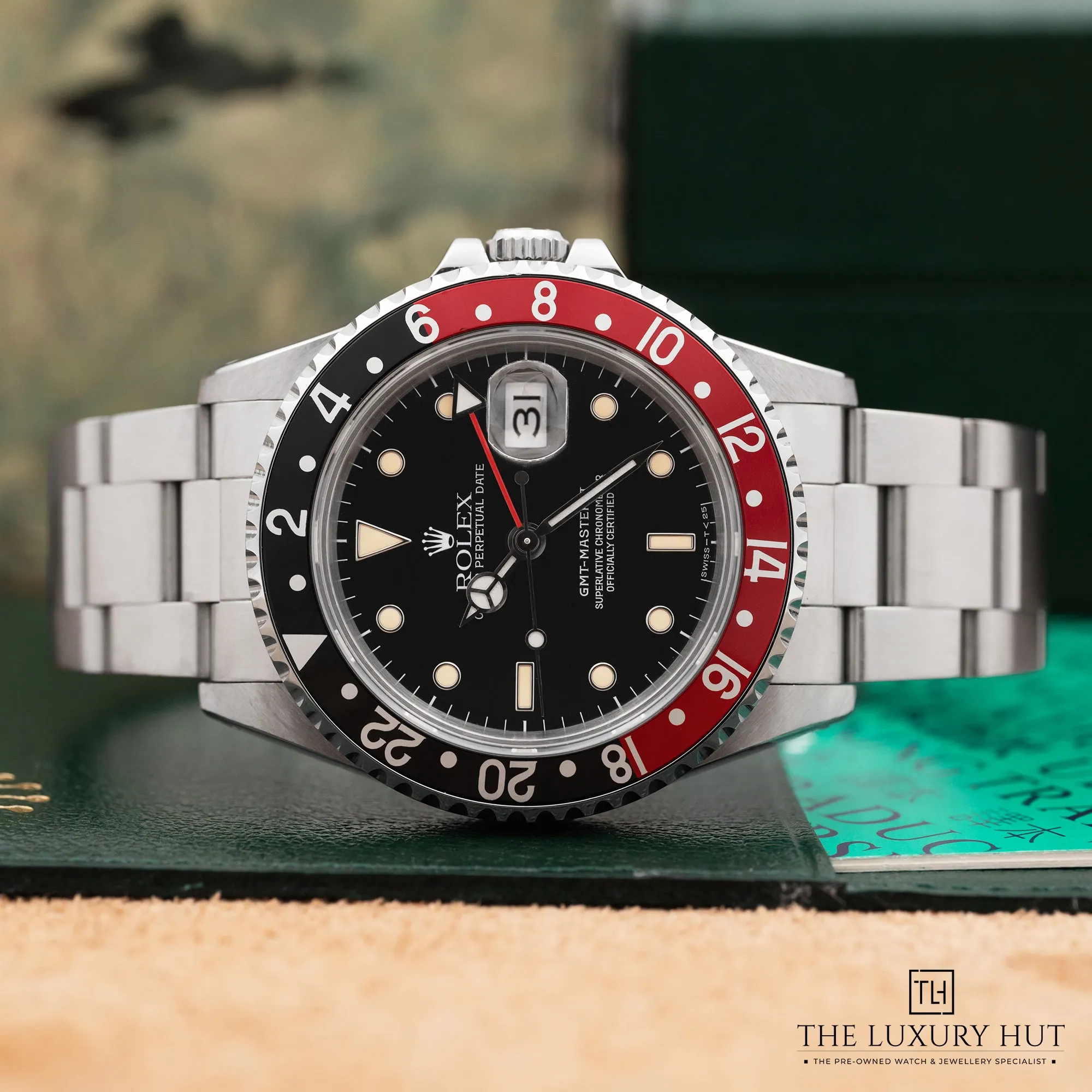 2025/12/76f01987-6804-480e-bf93-128e8c34e1f7Rolex_GMT-Master_II_Coke_Steel_40mm_Black_52442-c.jpg.webp