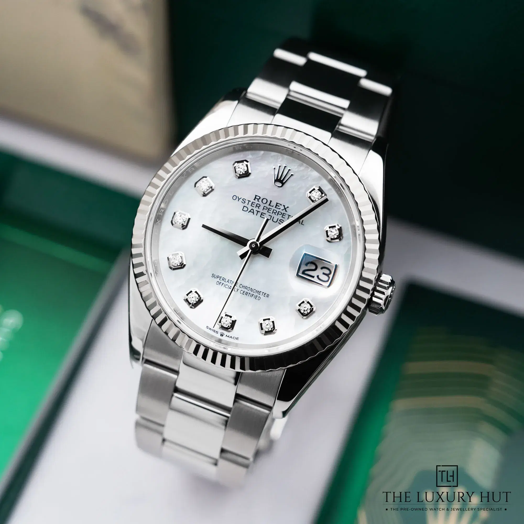 2025/12/d202a736-ede3-402a-8d84-742111199debRolex_Datejust_36_White_MOP_Diamond_Dial_52511-b.jpg.webp