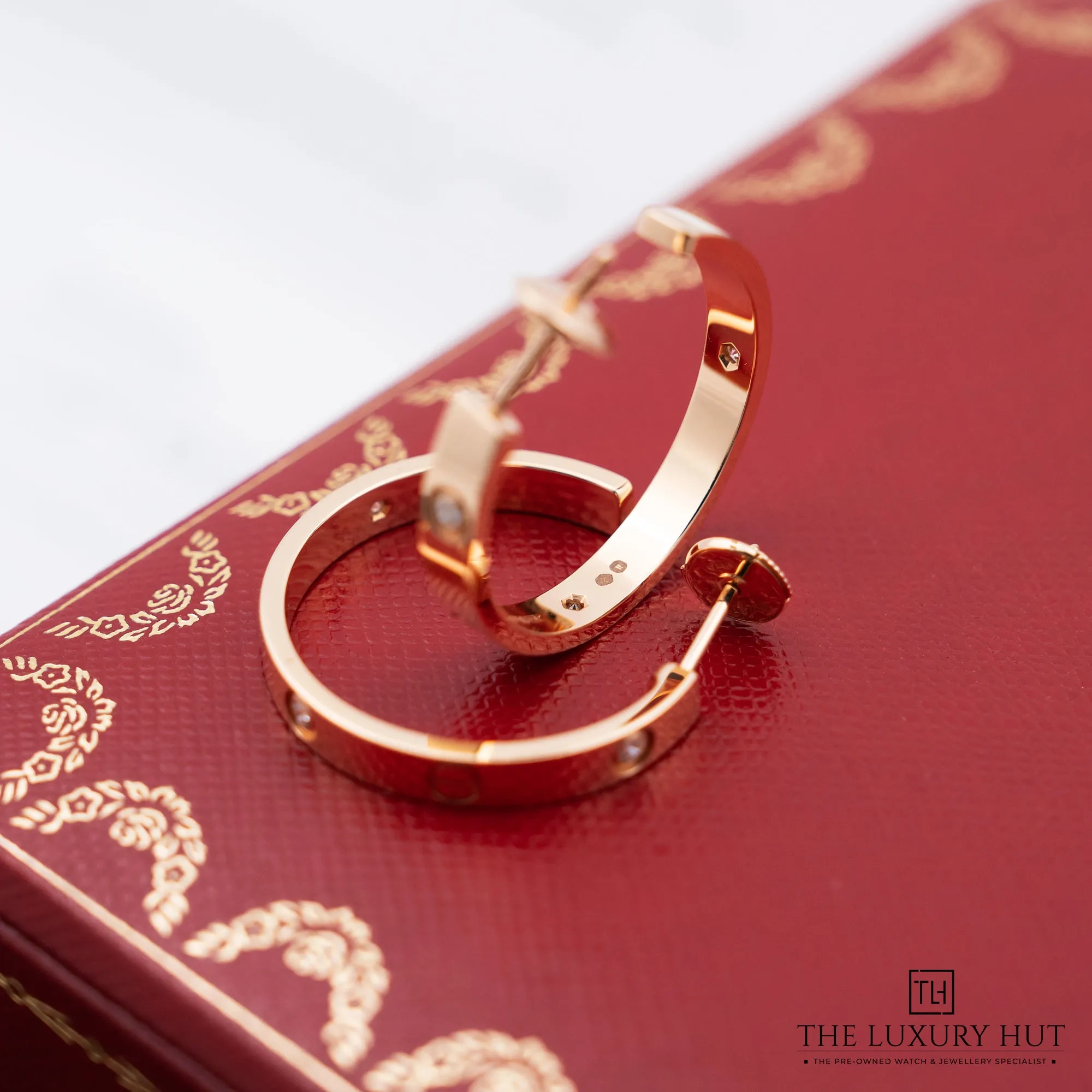 2026/01/9bda8a30-ae38-40a6-8365-71d74f369c7dCartier_Rose_Gold_Diamonds_Love_Hoop_Earrings_52550-d.jpg.webp