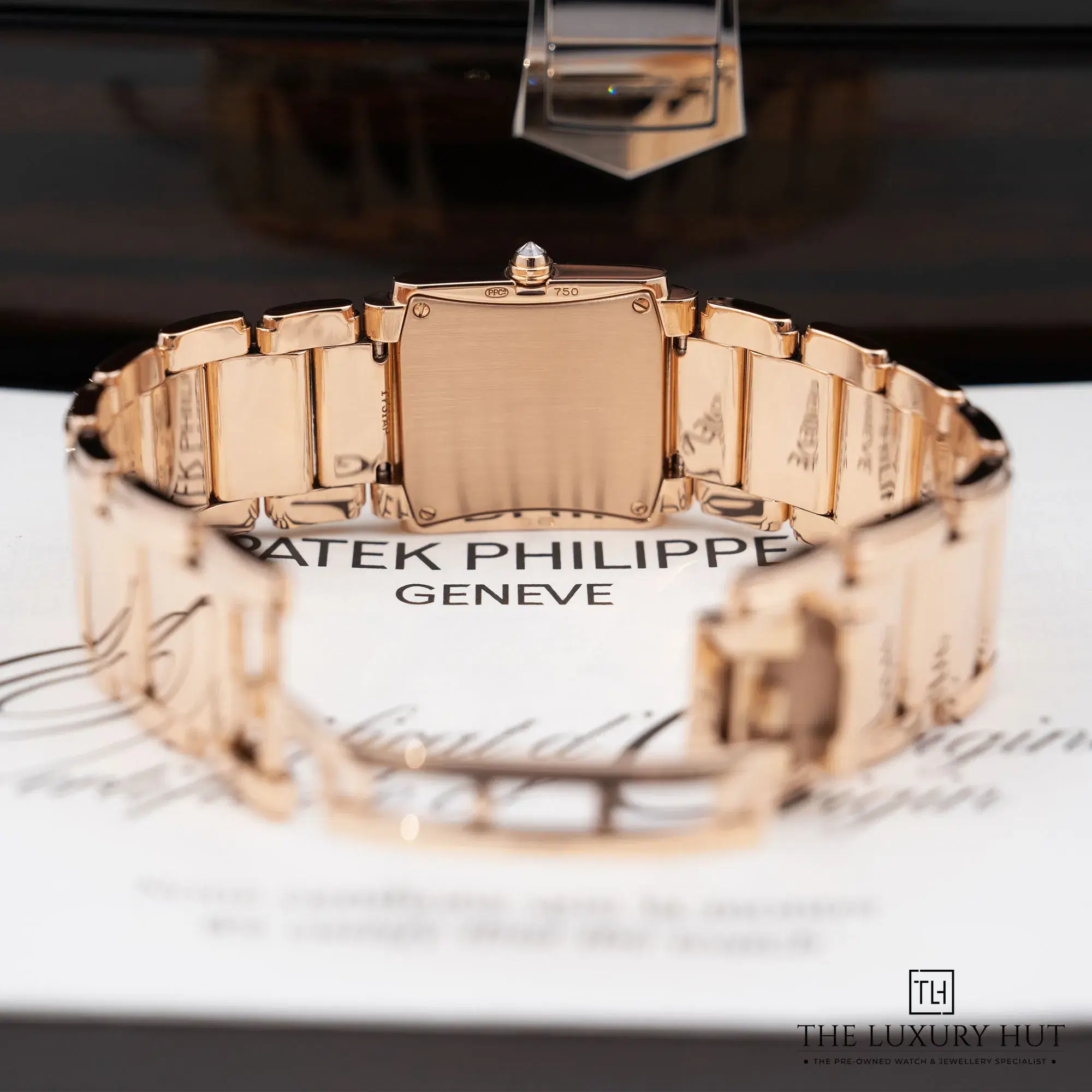 2026/01/eaff0705-7373-4492-a54c-aa15a4f6d173Patek_Philippe_Twenty-4_Gold_Brown_Diamond_52504-ee.jpg.webp