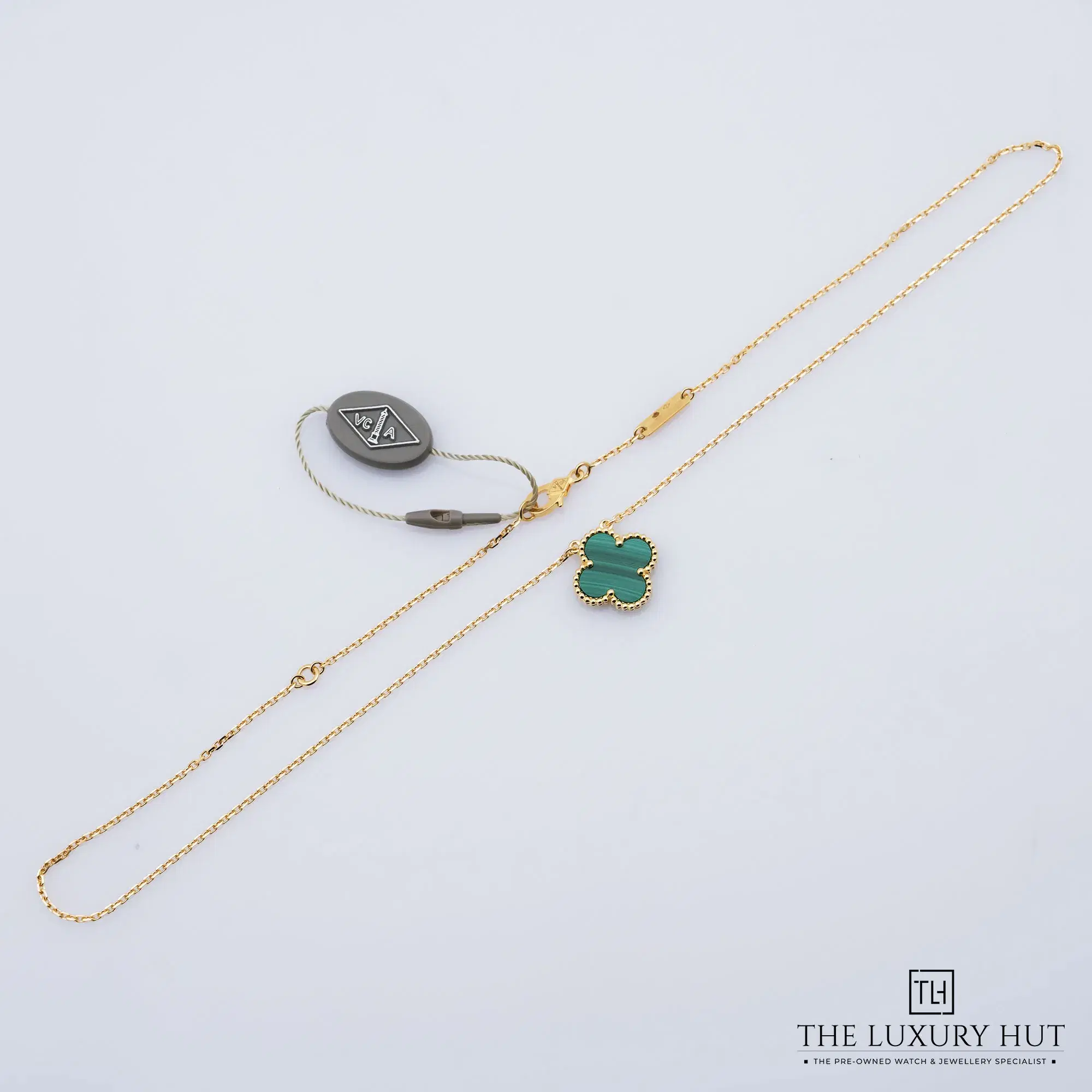 2026/02/062b198e-ebf0-47b7-b052-34a676394f8aVan_Cleef_Arpels_Gold_Malachite_Pendant_Necklace_52715-b.jpg.webp