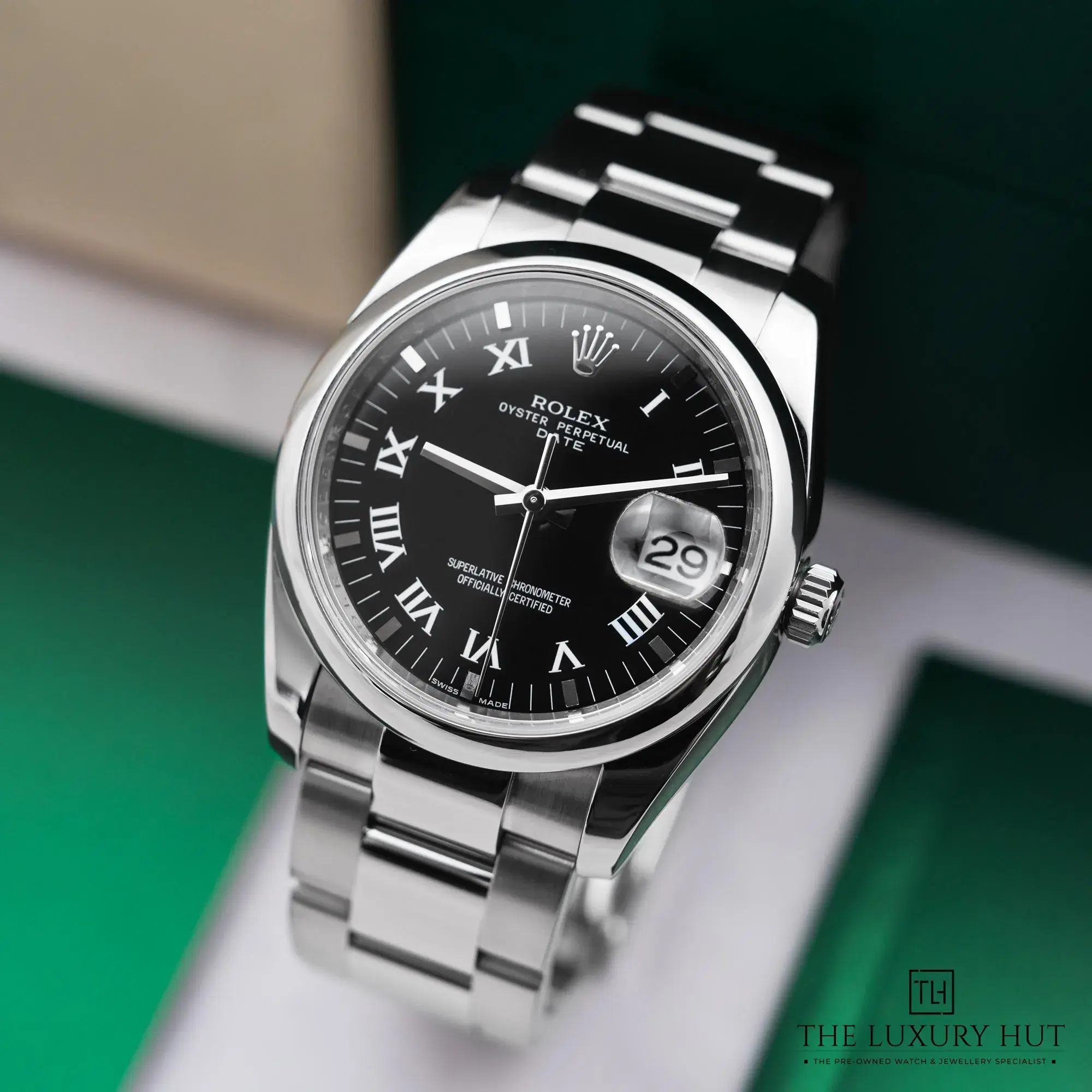 2026/02/1689c44f-7b87-403b-9770-80c992a01383Rolex_Oyster_Perpetual_Date_Steel_Black_Roman_LB809-b.jpg.webp