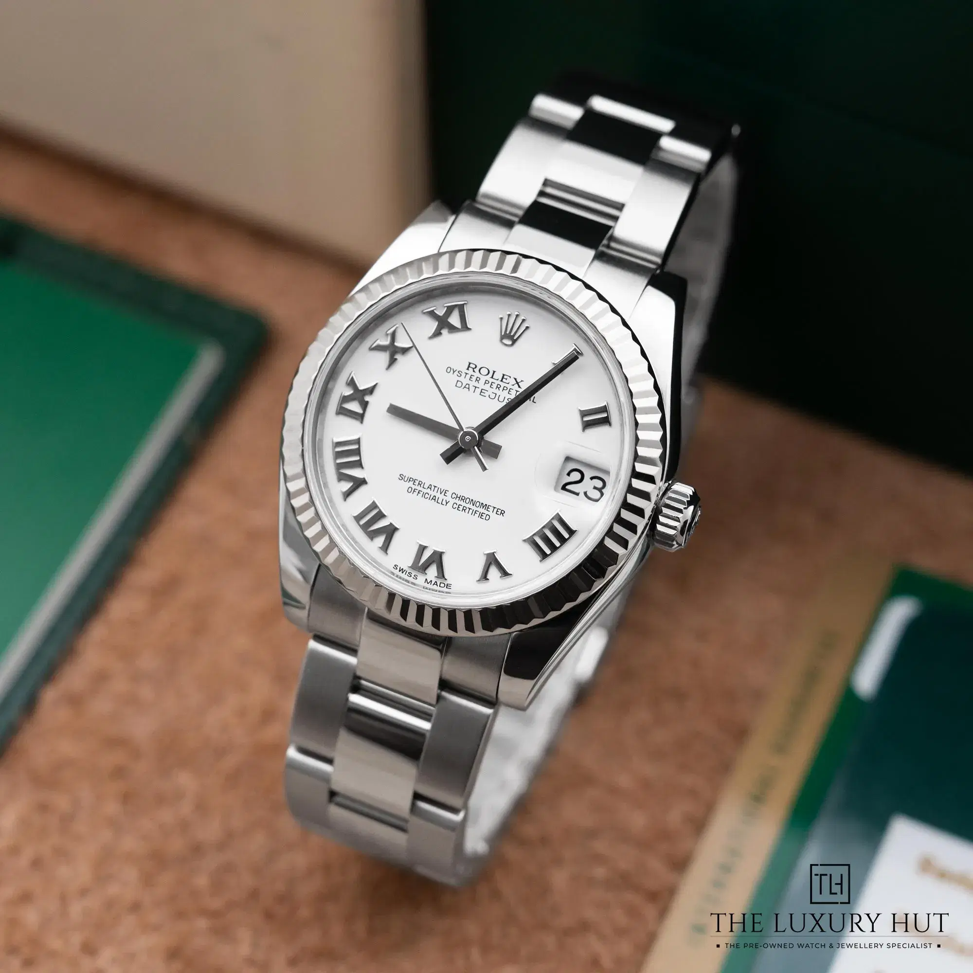 2026/02/3be957a7-72a5-44a9-bbb4-f2fc2d126d33Rolex_Datejust_31mm_White_Roman_Dial_52634-b.jpg.webp