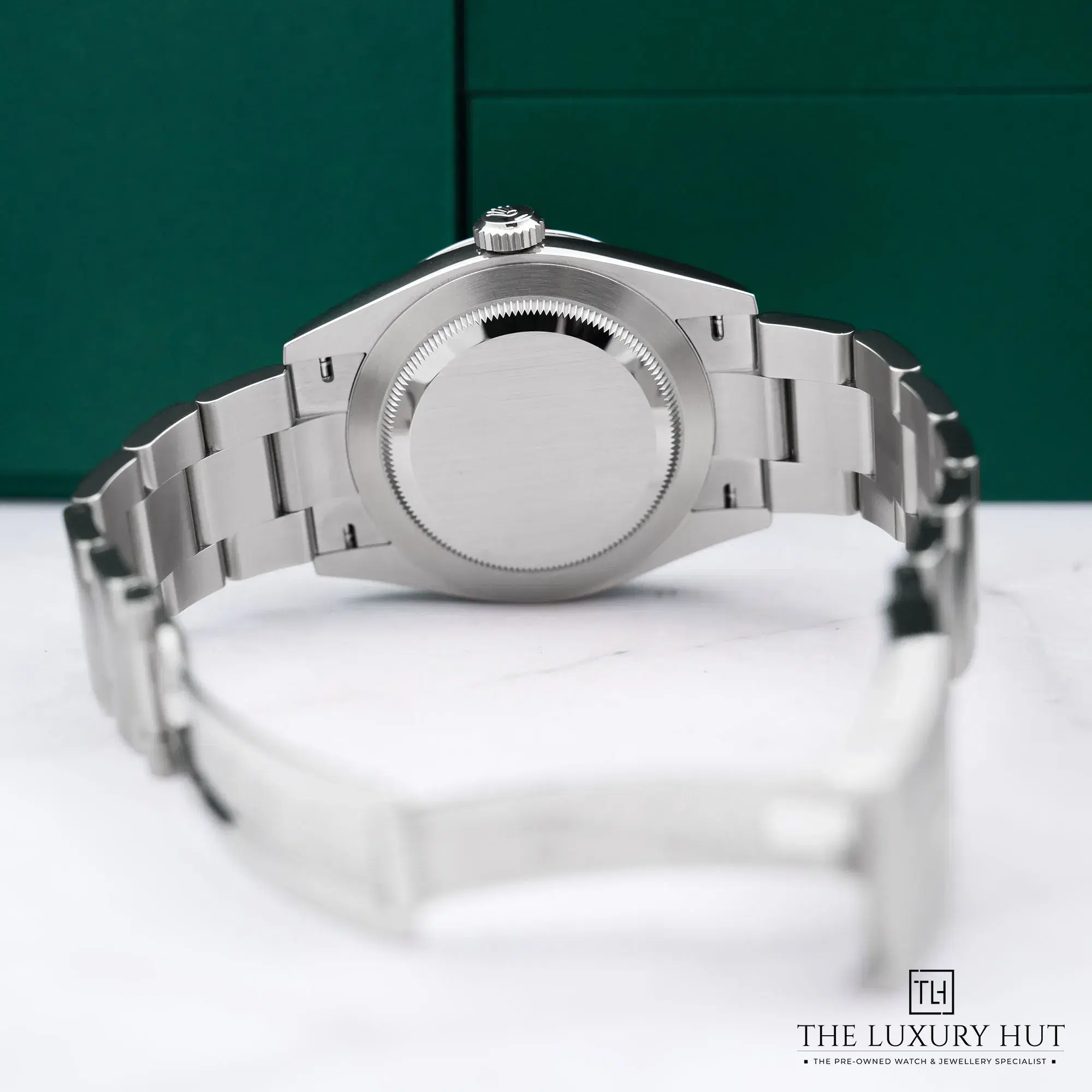 2026/02/a81970fe-14d6-4af9-877d-8e8723e62398Rolex_Oyster_Perpetual_41mm_Steel_Silver_Dial_52647-d.jpg.webp