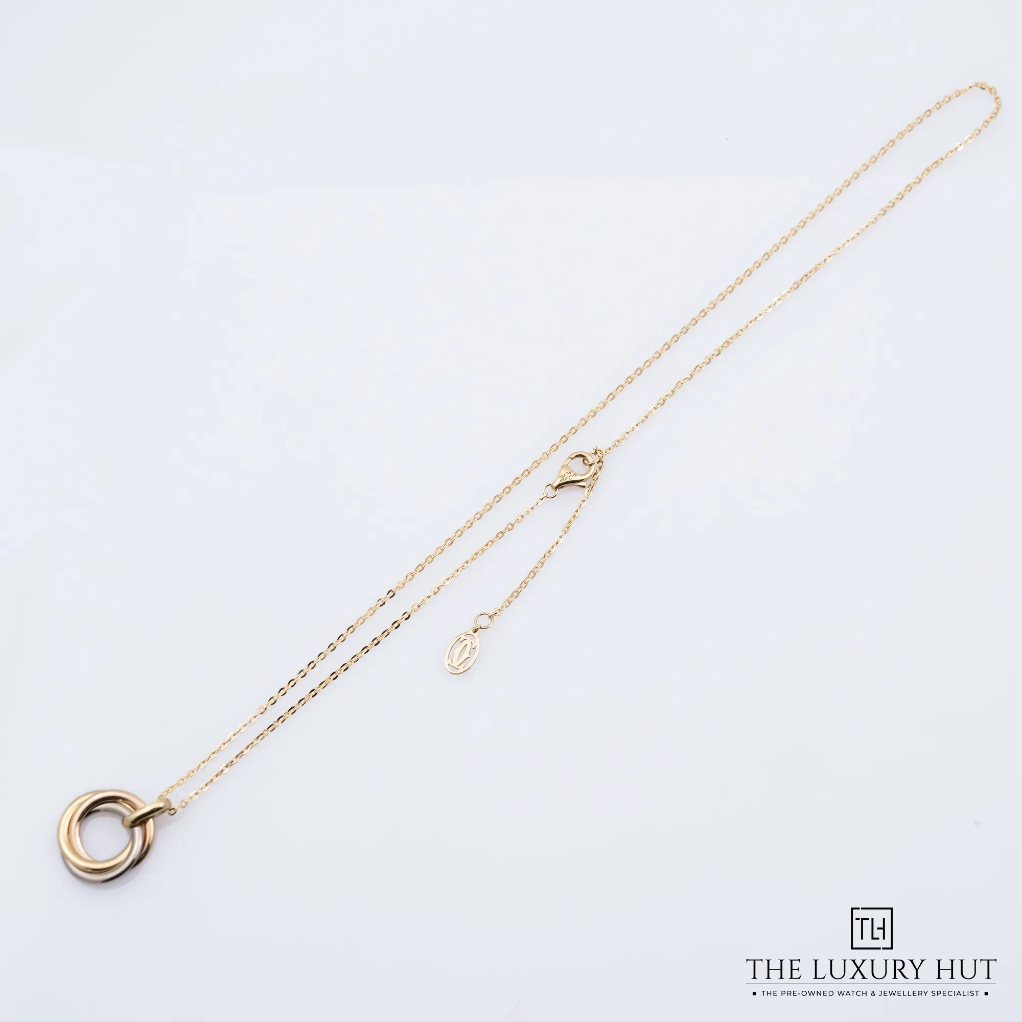 2026/02/ddaea9e2-4a26-47e5-85b1-60e7969ad41bCartier_Trinity_Pendant_Necklace_Small_Gold_52706-b.jpg.webp