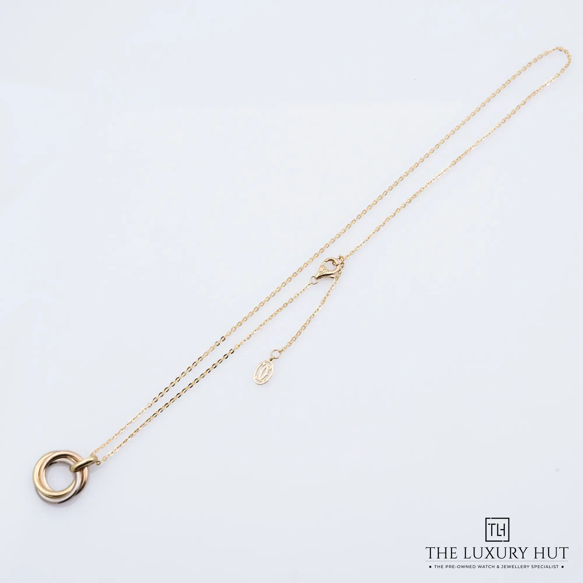 2026/02/ddaea9e2-4a26-47e5-85b1-60e7969ad41bCartier_Trinity_Pendant_Necklace_Small_Gold_52706-b.jpg.webp