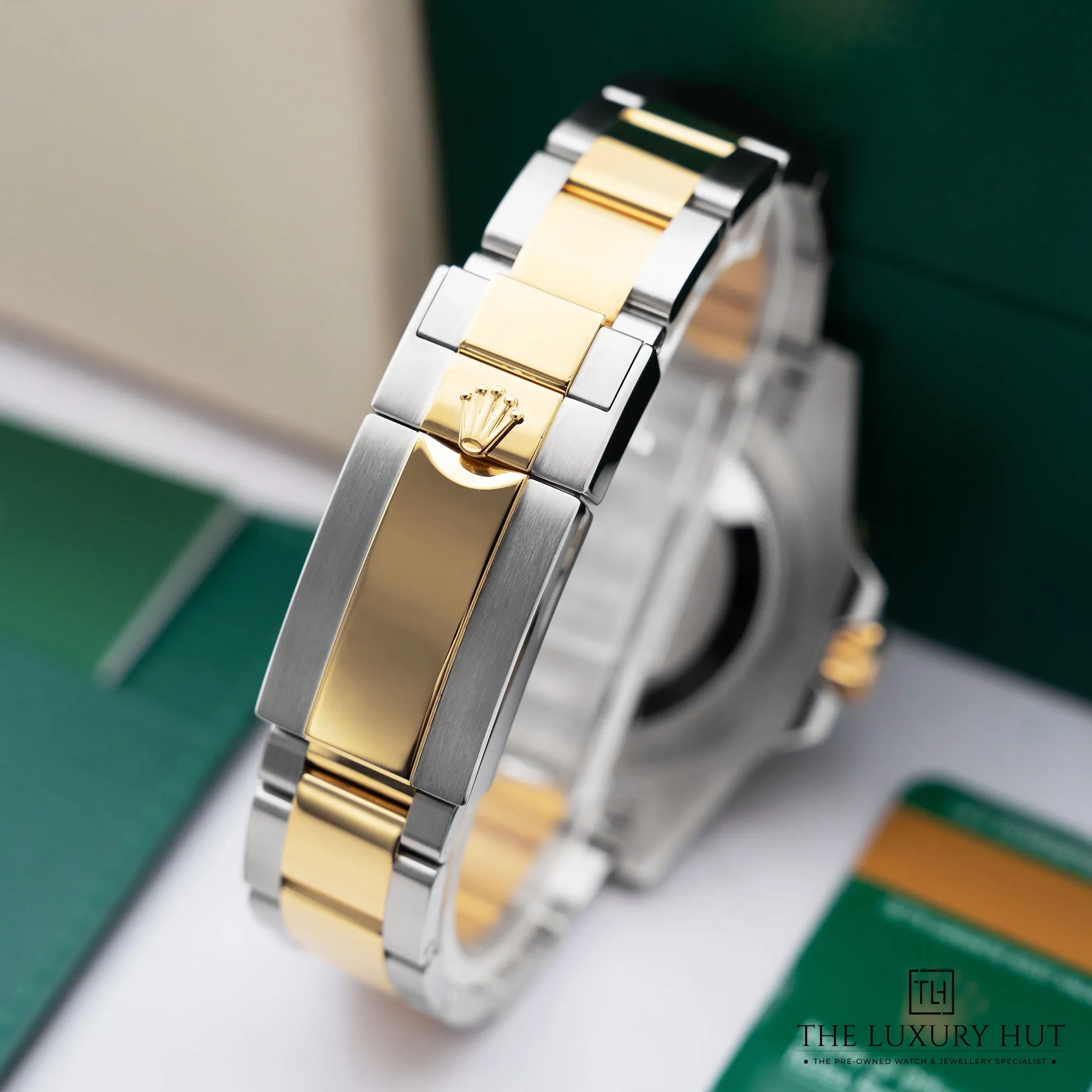 2026/02/f2fde5db-f6d2-4598-8418-fac850579eb4Rolex_GMT-Master_II_Steel_Yellow_Gold_Black_52614-e.jpg.webp