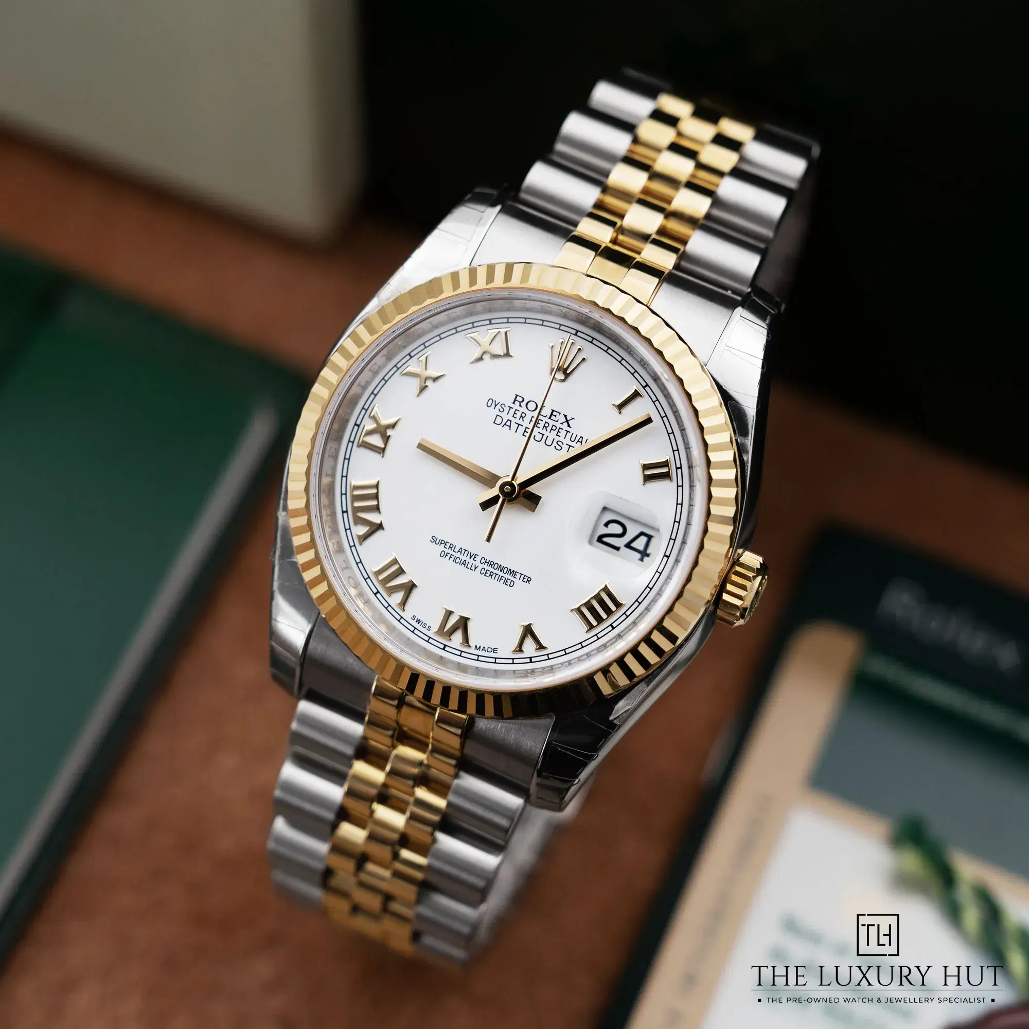 2026/03/048372f1-7f5b-48af-85ca-07e25013229eRolex_Datejust_36_Steel_Gold_White_Roman_Dial_52773-b.jpg.webp