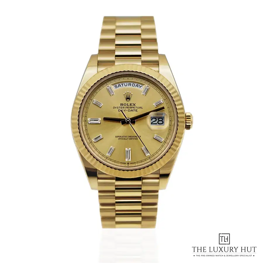 Rolex Day Date 40 Gold Champagne Diamond 228238