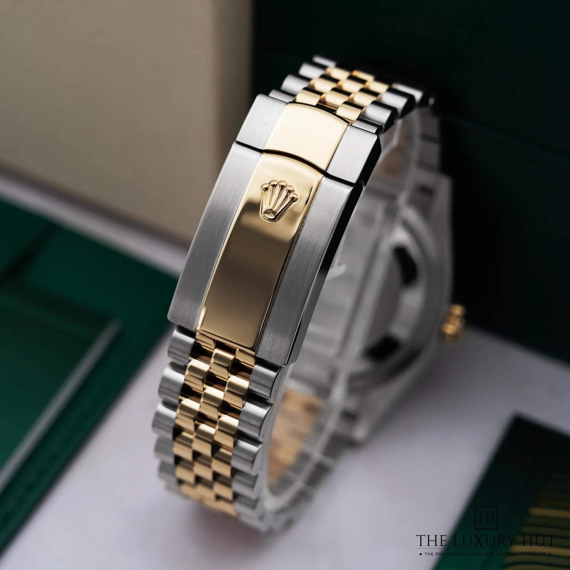 2026/03/29221f5f-ae7c-4920-8b72-bacddb86695aRolex_Datejust_36_Olive_Green_Roman_Diamond_52714-d.jpg.webp