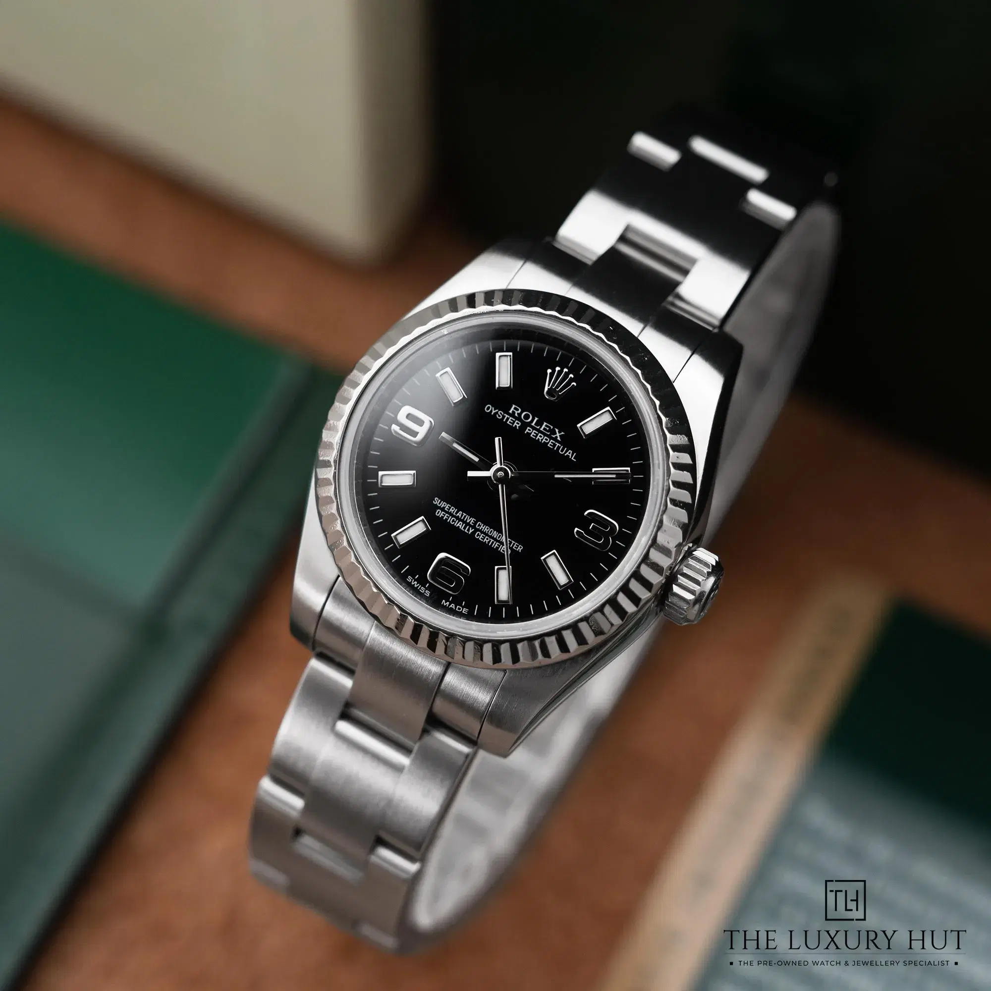 2026/03/3f53790b-dcb0-4ba3-b455-8158f5ca6109Rolex_Ladies_Oyster_Perpetual_26_Black_Dial_52686-b.jpg.webp