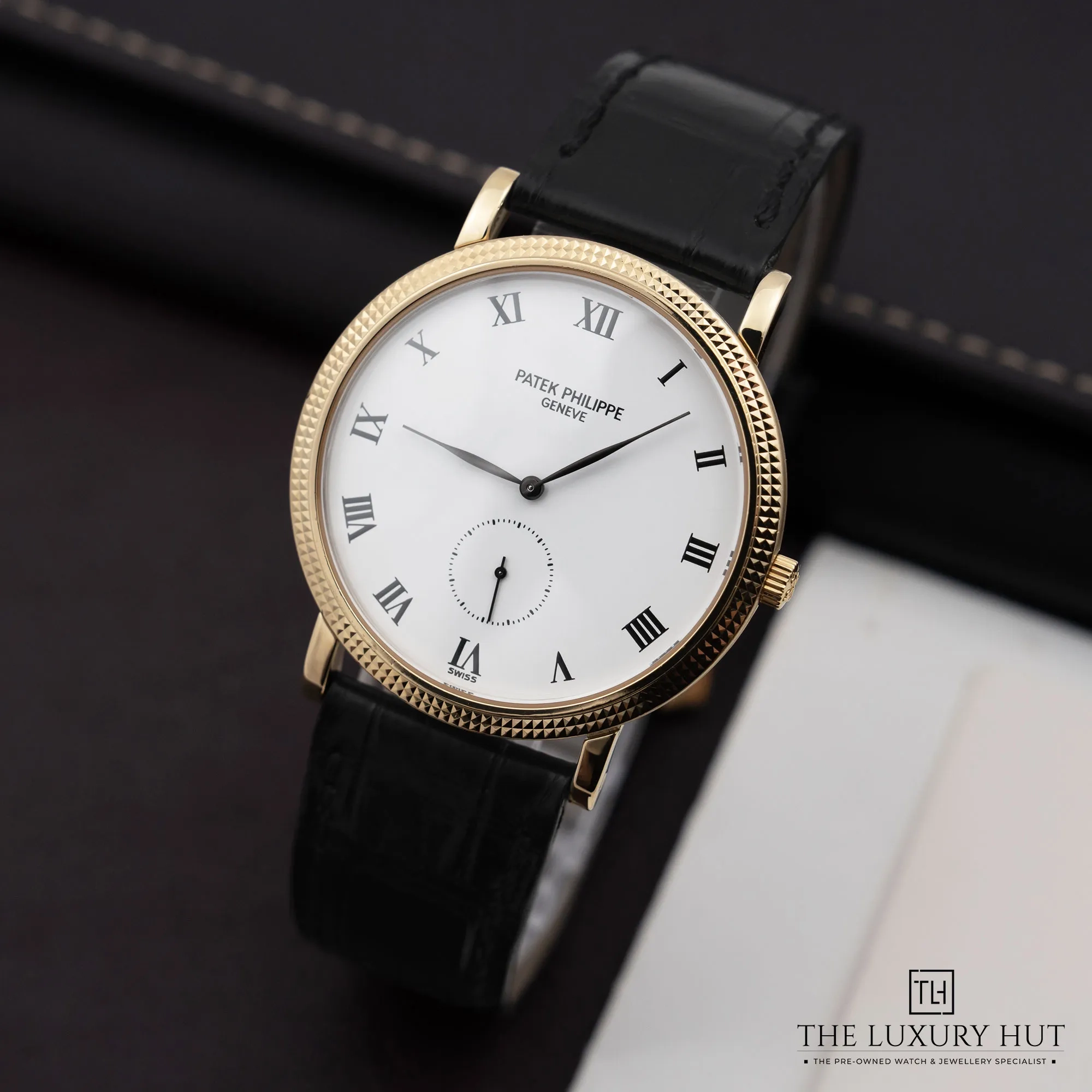 2026/03/494639fe-3eef-46d0-aaec-0ceddb8dd3b6Patek_Philippe_Calatrava_33mm_Yellow_Gold_White_52659-b.jpg.webp