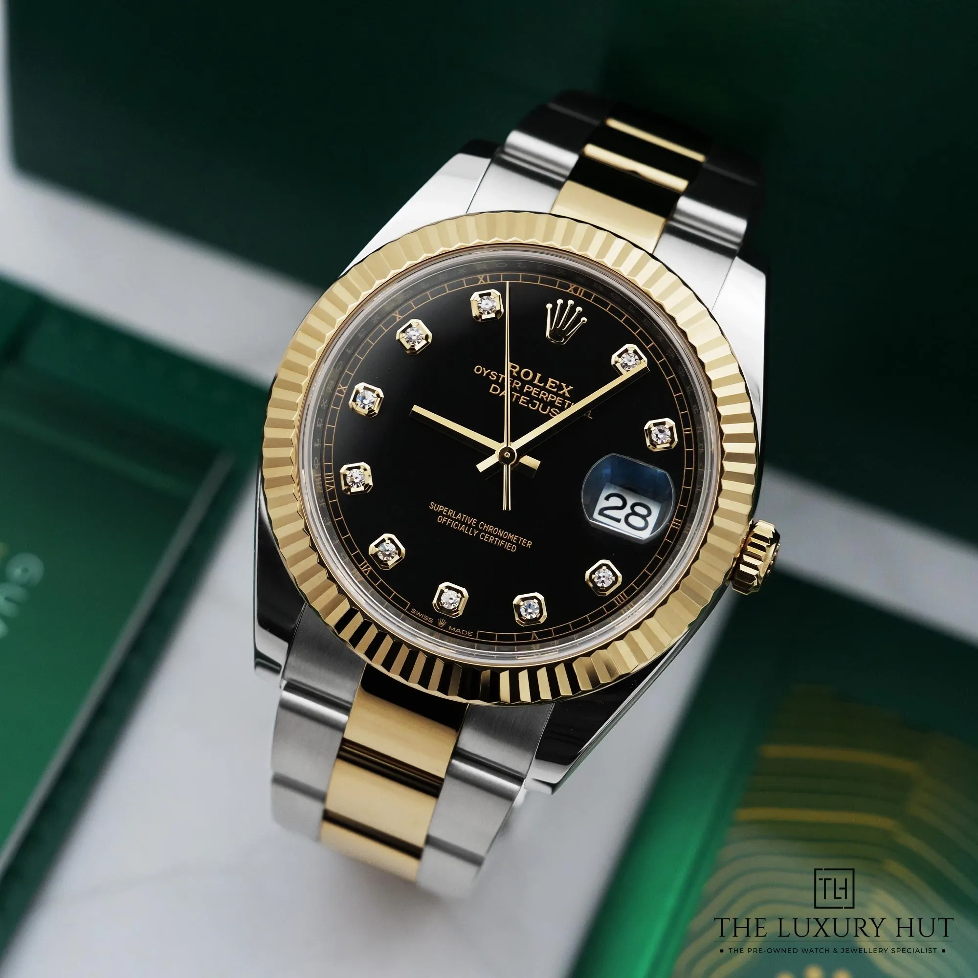 2026/03/4e5f2d75-c6bd-426b-aa29-84e56dca9362Rolex_Datejust_41_Steel_Gold_Black_Diamond_52765-b.jpg.webp