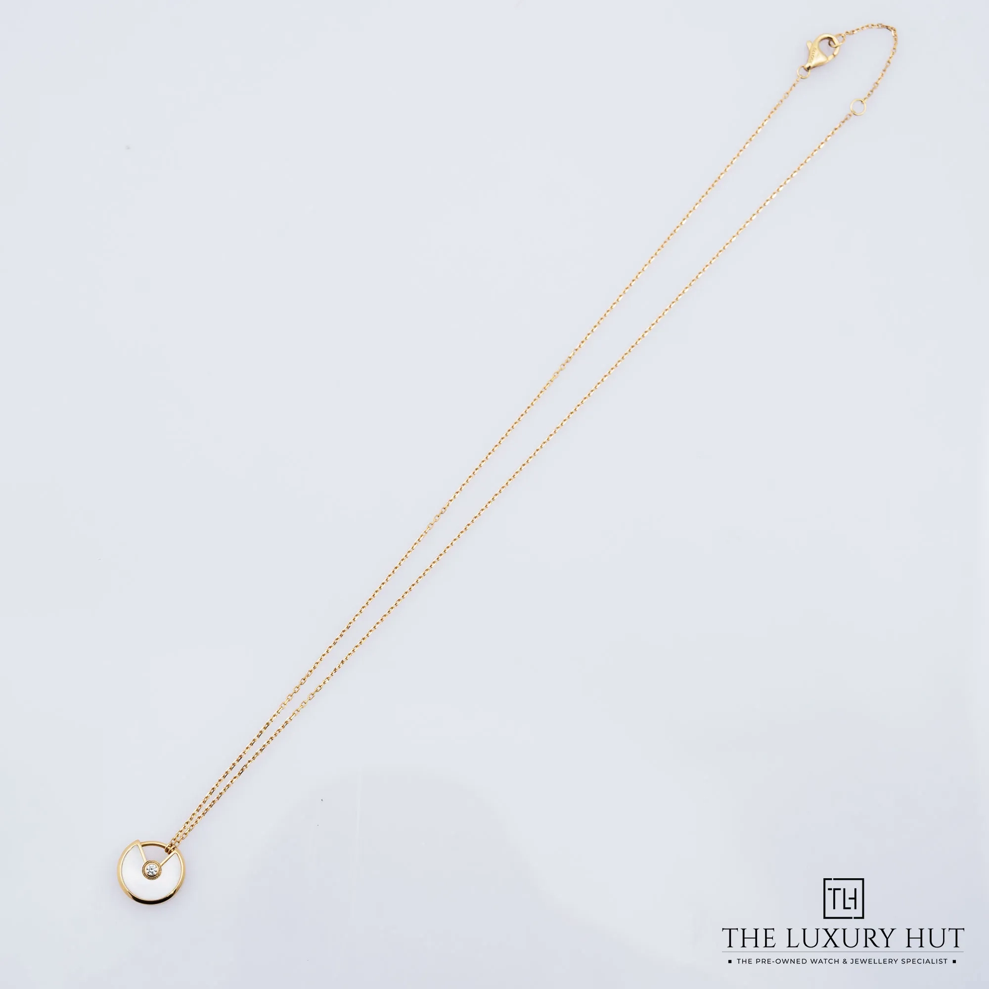 2026/03/6845357d-c8da-4755-be5c-18c340f23056Cartier_Amulette_De_Cartier_MOP_Diamond_Pendant_52733-b.jpg.webp