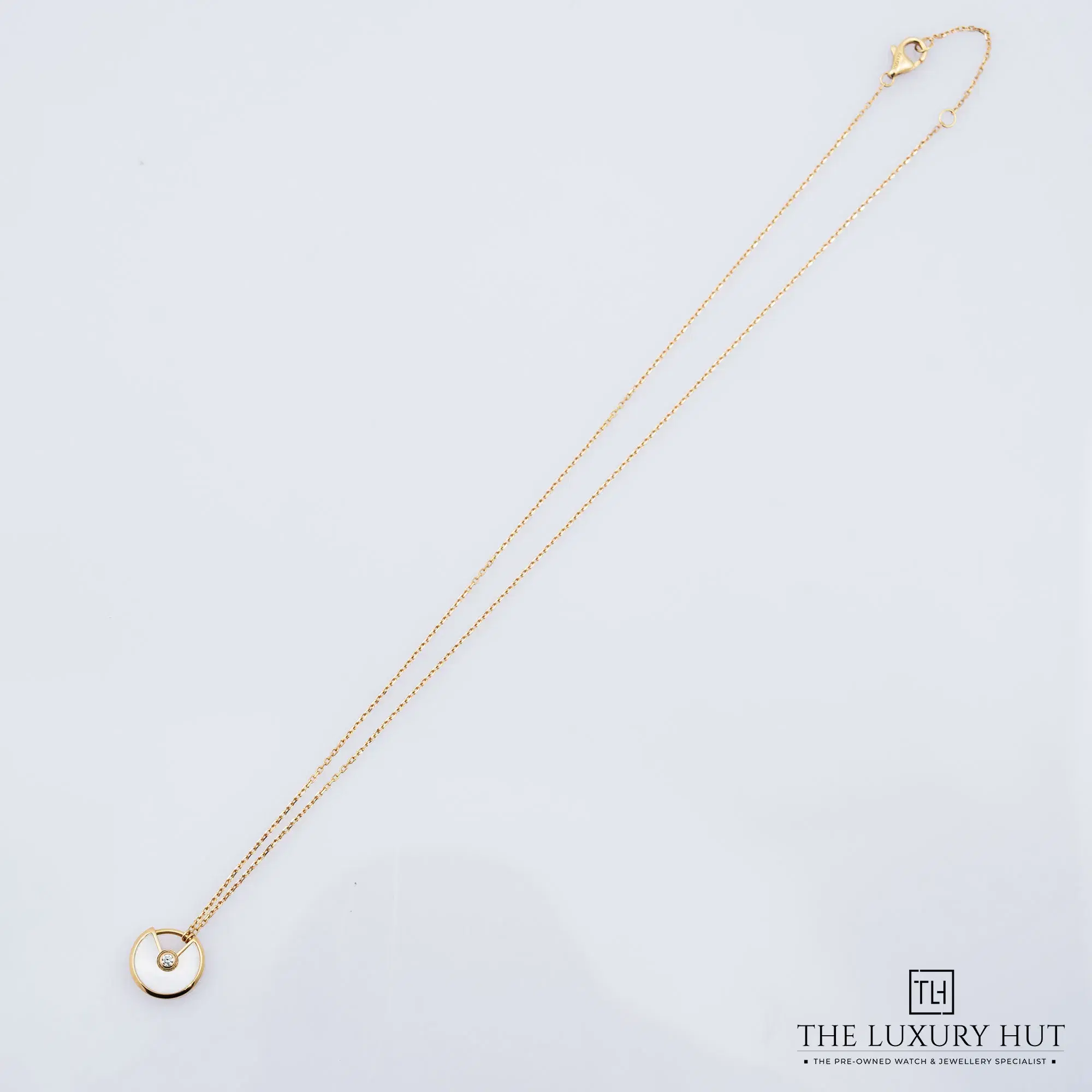 2026/03/6845357d-c8da-4755-be5c-18c340f23056Cartier_Amulette_De_Cartier_MOP_Diamond_Pendant_52733-b.jpg.webp