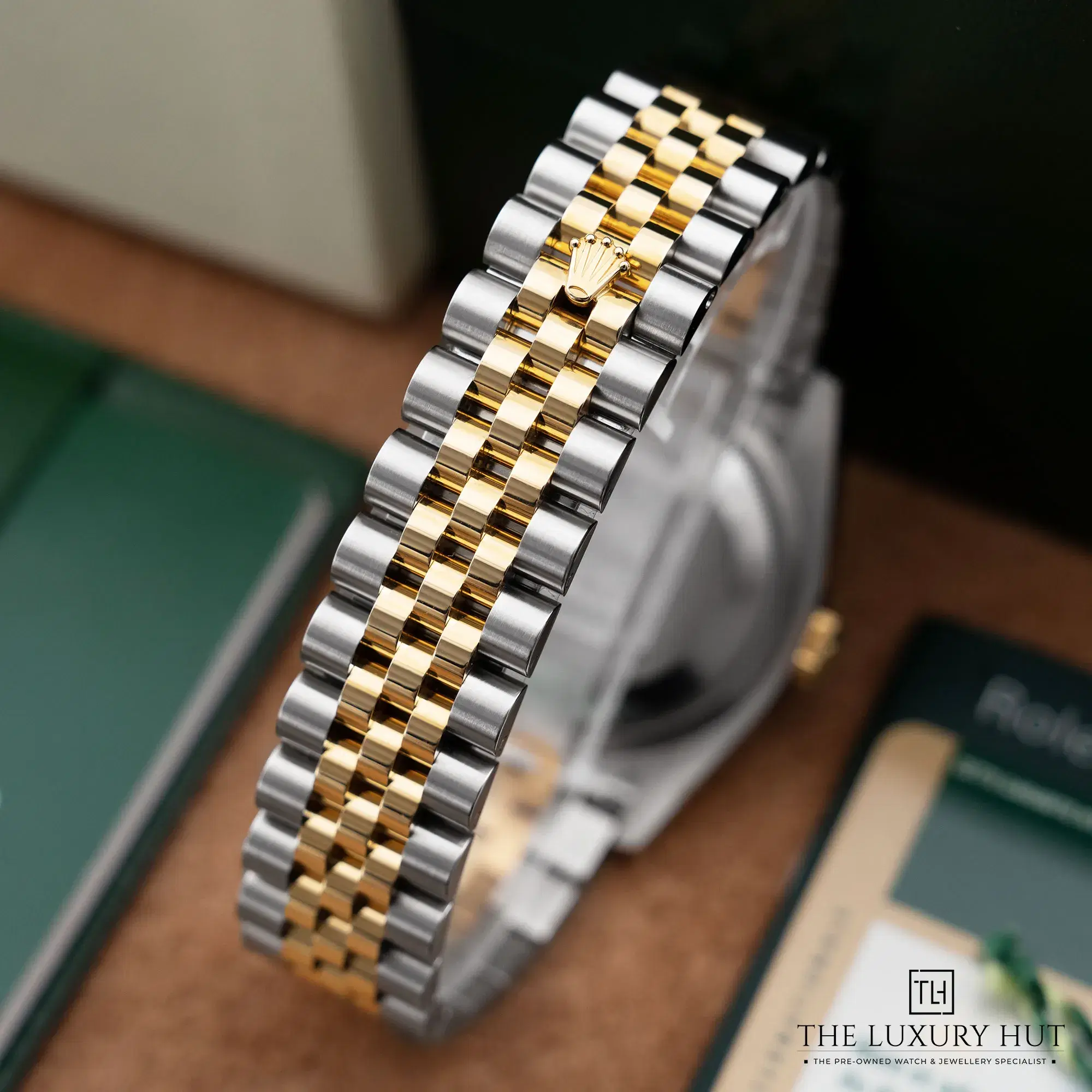 2026/03/7ab507c6-88c2-4724-a2da-7b5f7b17eca3Rolex_Datejust_36_Steel_Gold_White_Roman_Dial_52773-e.jpg.webp