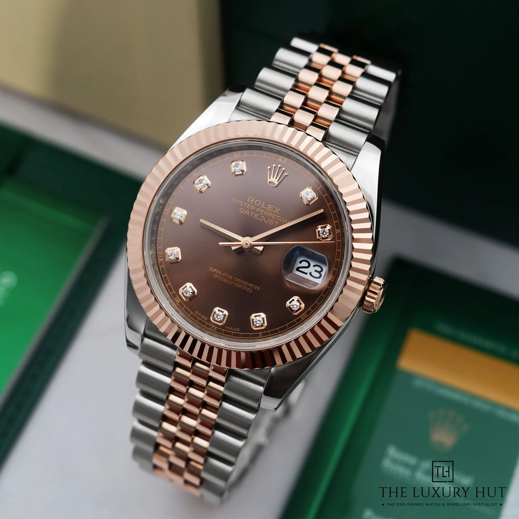 2026/03/81f66292-6cdf-4fa4-9d06-8ea3e1604dbeRolex_Datejust_Steel_Gold_41mm_Chocolate_Diamond_52776-b.jpg.webp