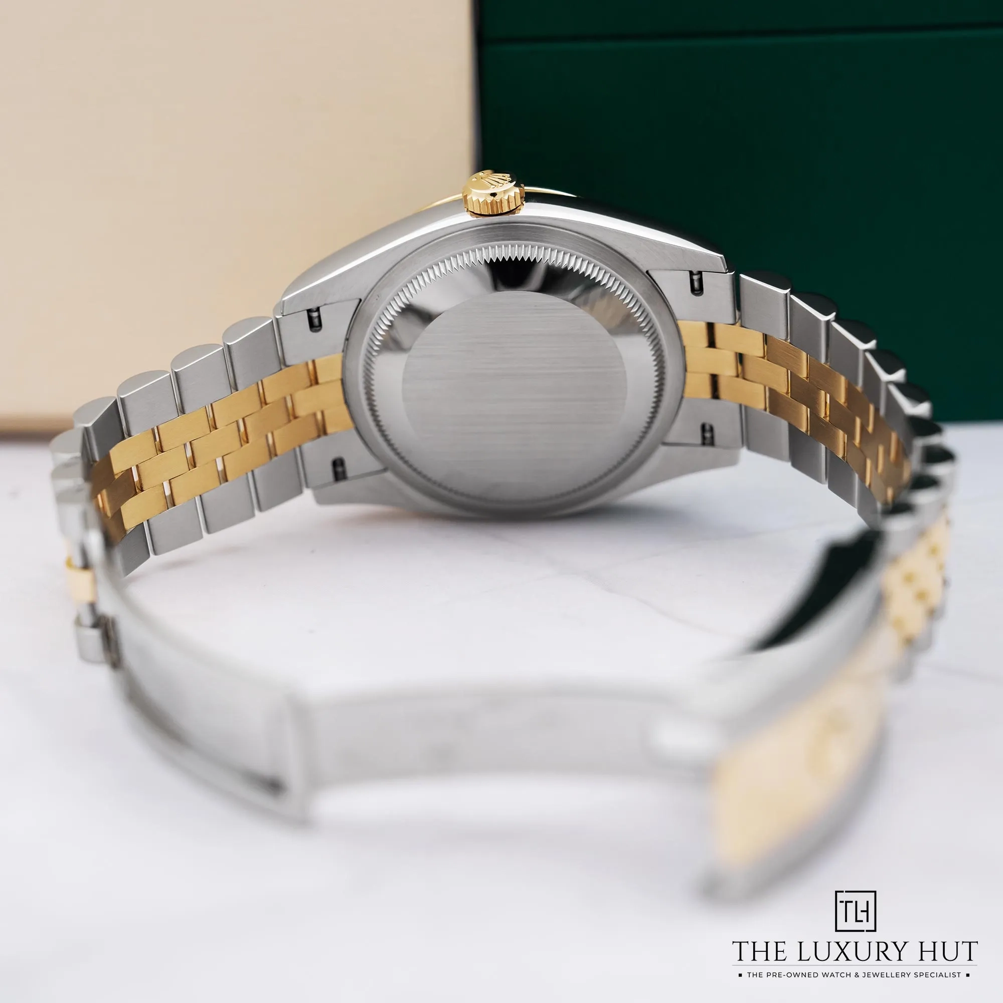 2026/03/978f5748-f812-4398-be64-40b723ed2bc1Rolex_Datejust_36_Olive_Green_Roman_Diamond_52714-c.jpg.webp