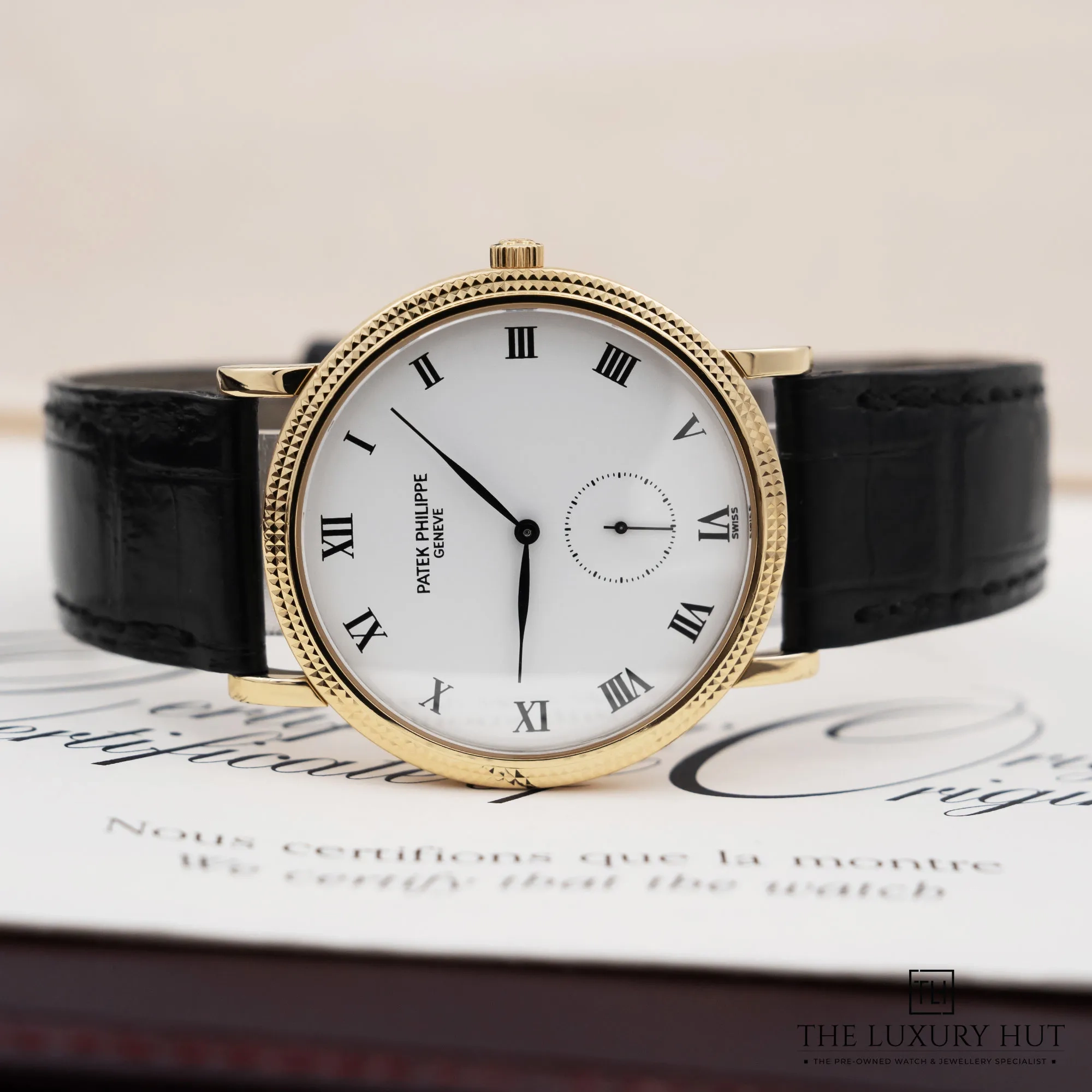 2026/03/9d9a17a5-3842-4066-b02f-649cd78279c7Patek_Philippe_Calatrava_33mm_Yellow_Gold_White_52659-c.jpg.webp