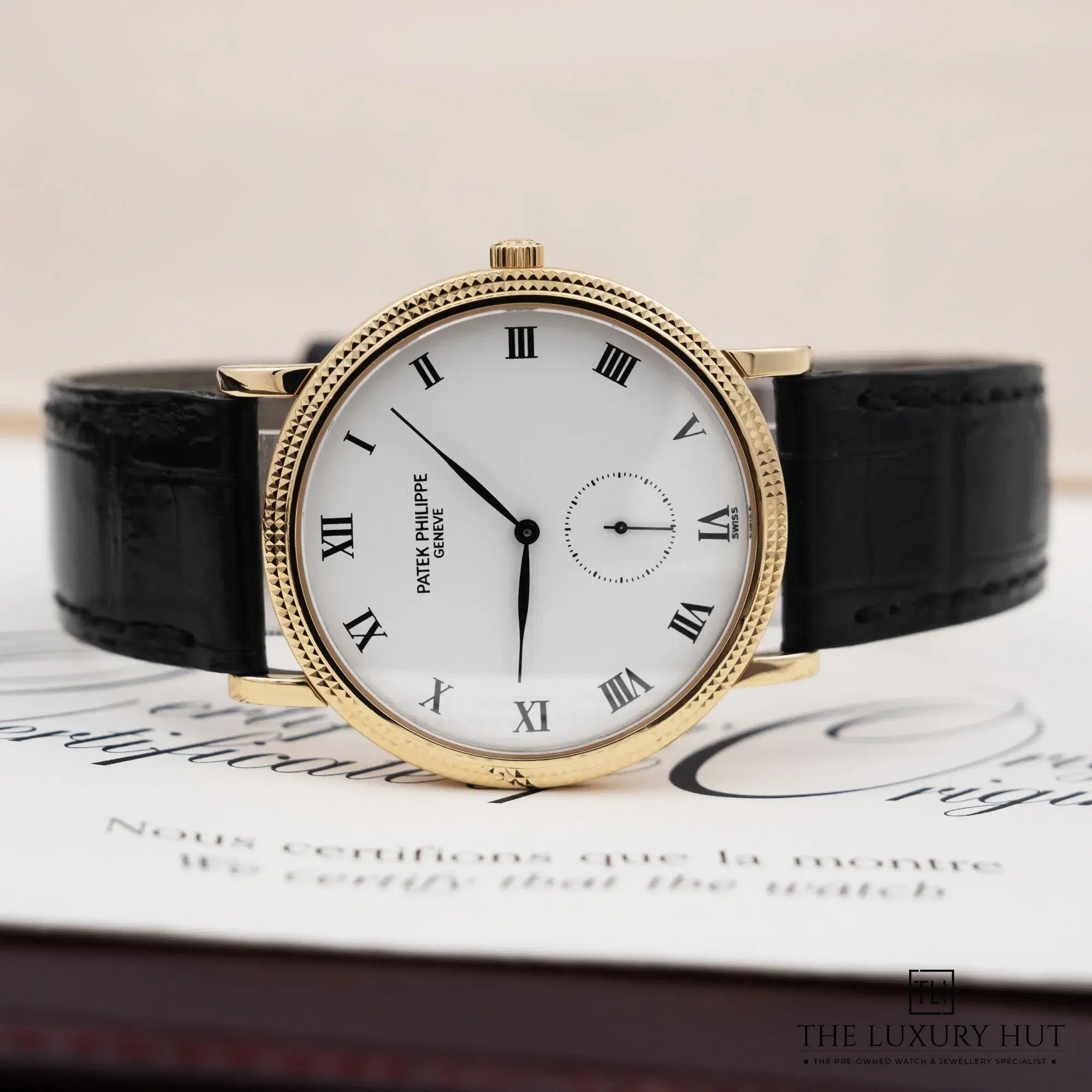 2026/03/9d9a17a5-3842-4066-b02f-649cd78279c7Patek_Philippe_Calatrava_33mm_Yellow_Gold_White_52659-c.jpg.webp