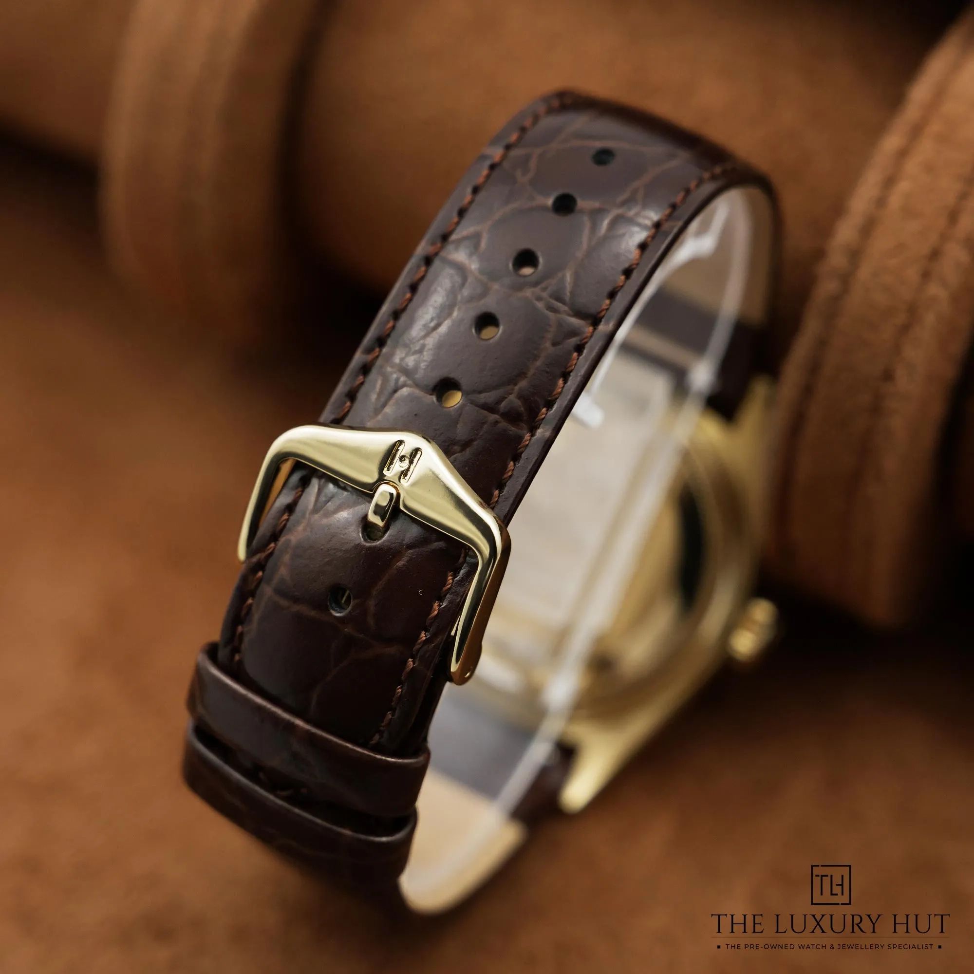2026/03/c74f1eea-ec85-48fe-8299-c5887833a361Rolex_Day-Date_36mm_Yellow_Gold_Champagne_52762-d.jpg.webp
