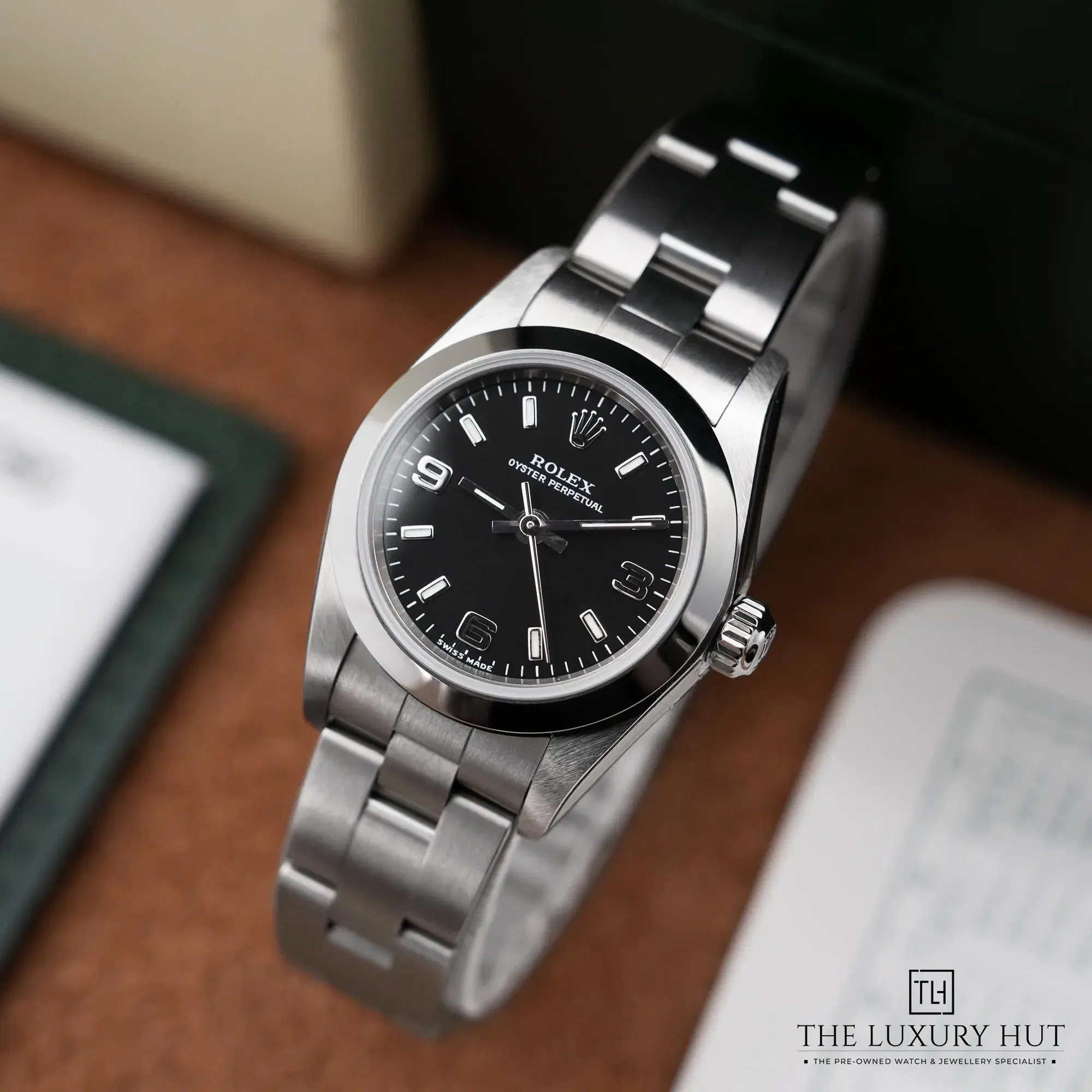 2026/03/de5b0188-05c7-4d96-b68a-e0dbde4d94e1Rolex_Oyster_Perpetual_Steel_24_Black_Arabic_Dial_52756-b.jpg.webp
