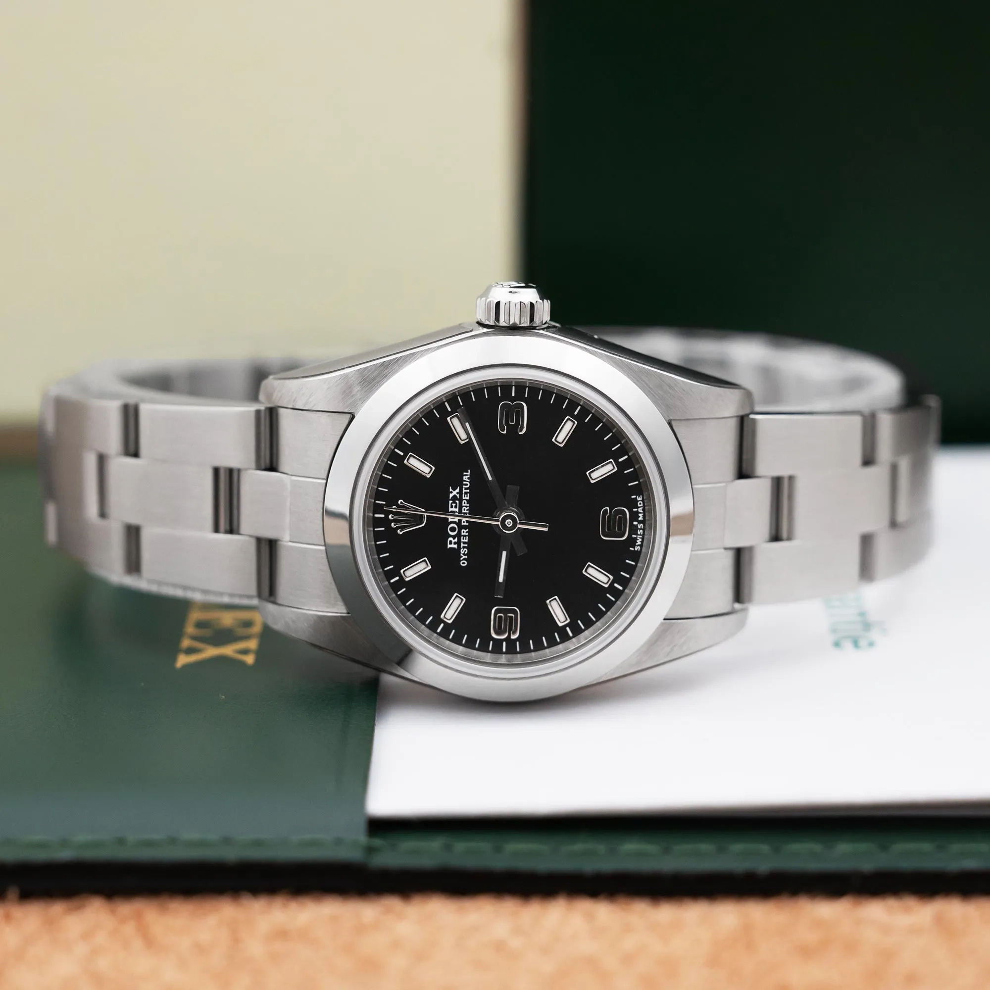 2026/03/e7bf173c-f86b-4dd0-81e1-df3d9e2a354cRolex_Oyster_Perpetual_Steel_24_Black_Arabic_Dial_52756-f.jpg.webp
