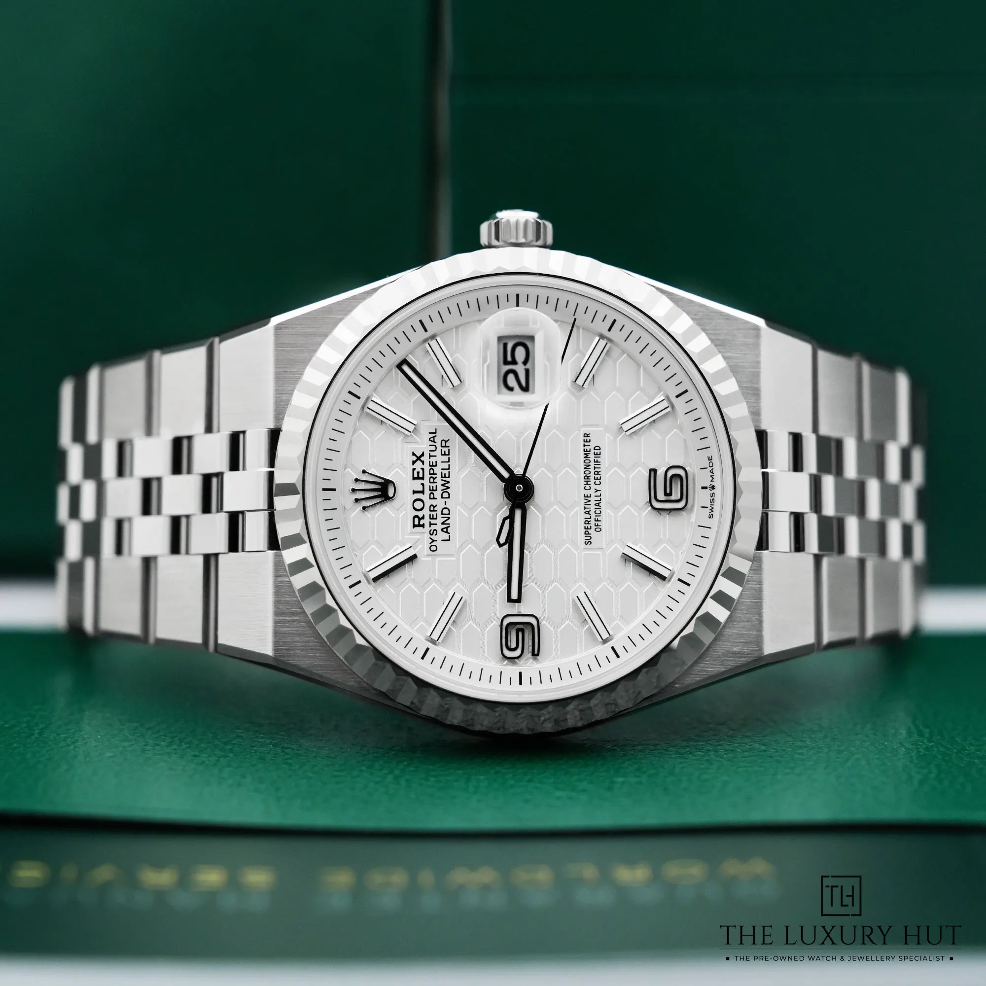 2026/03/eb69ed94-4361-4e65-8a6c-6439ea944693Rolex_Land-Dweller_36_White_Honeycomb_Dial_52853-c.jpg.webp